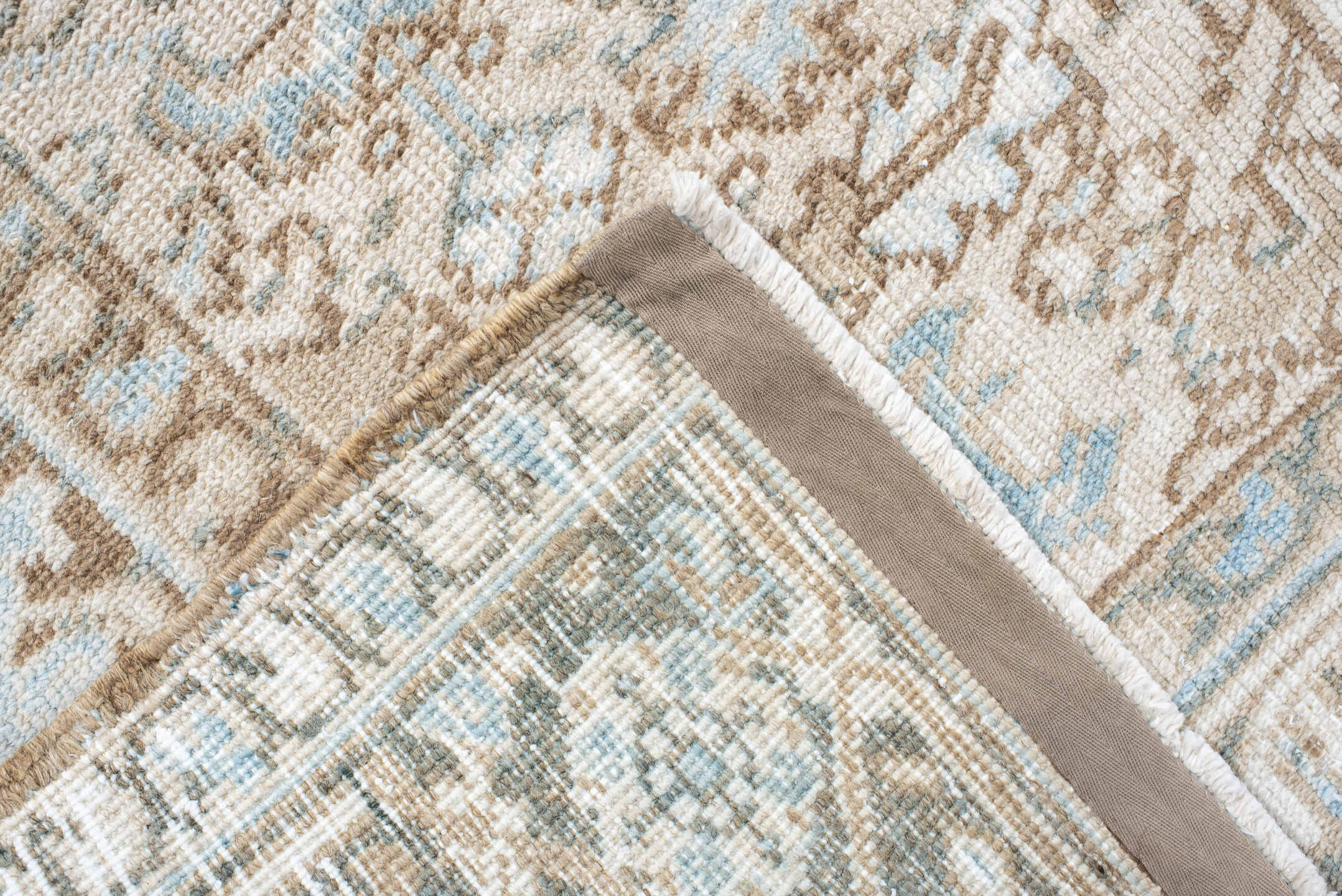 7' x 8' one-of-a-kind handmade antique Heriz rug. Color palette: ivory, camel, pale blue, taupe, light gray, sand, beige