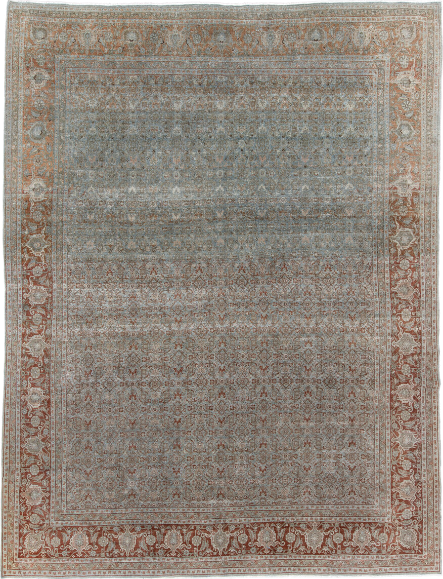 9' x 11' one-of-a-kind handmade antique Tabriz large size rug. Color palette: blue, rust, ivory, taupe, camel, terracotta