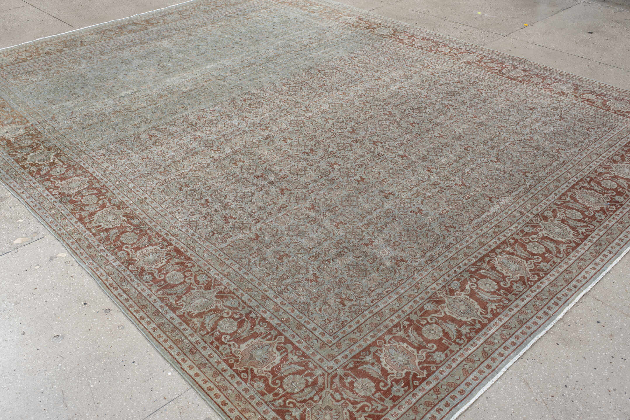 9' x 11' one-of-a-kind handmade antique Tabriz large size rug. Color palette: blue, rust, ivory, taupe, camel, terracotta