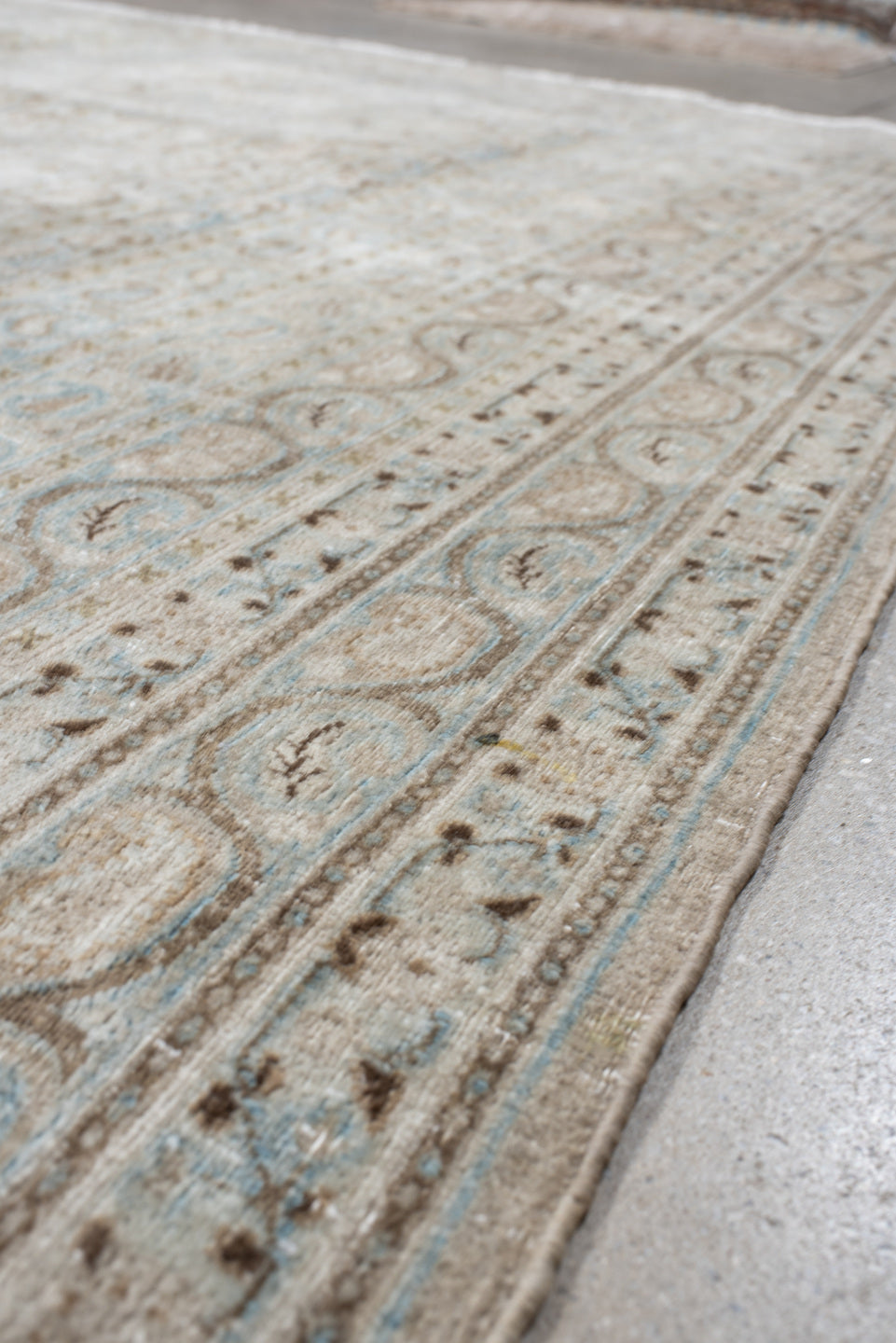 7' x 10' one-of-a-kind handmade antique Meshed large size rug. Color palette: ivory, light blue, taupe, beige, camel, brown