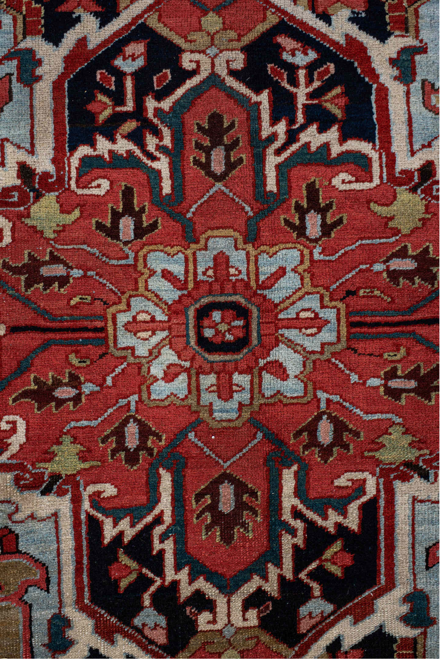 9' x 12' one-of-a-kind handmade antique Heriz large size rug. Color palette: rust, navy, ivory, sky blue, soft gold, coral