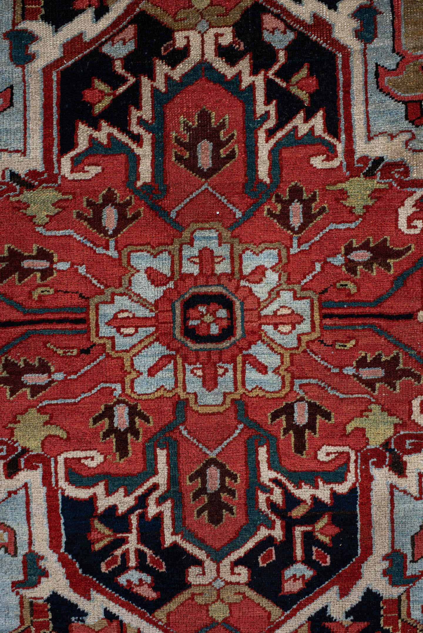 9' x 12' one-of-a-kind handmade antique Heriz large size rug. Color palette: rust, navy, ivory, sky blue, soft gold, coral