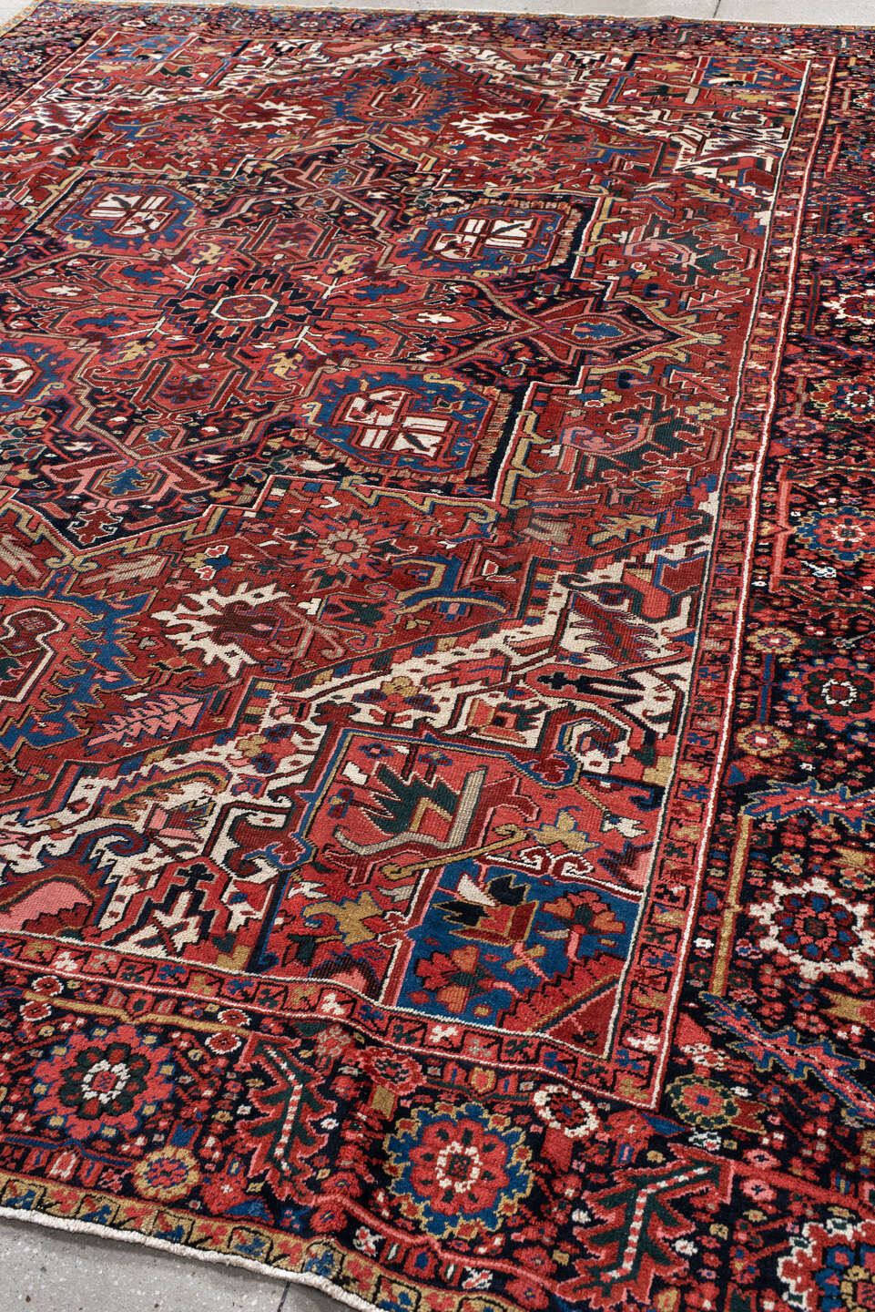 9' x 11' one-of-a-kind handmade vintage Heriz large size rug. Color palette: black, blue, brown, charcoal, fire brick, gray