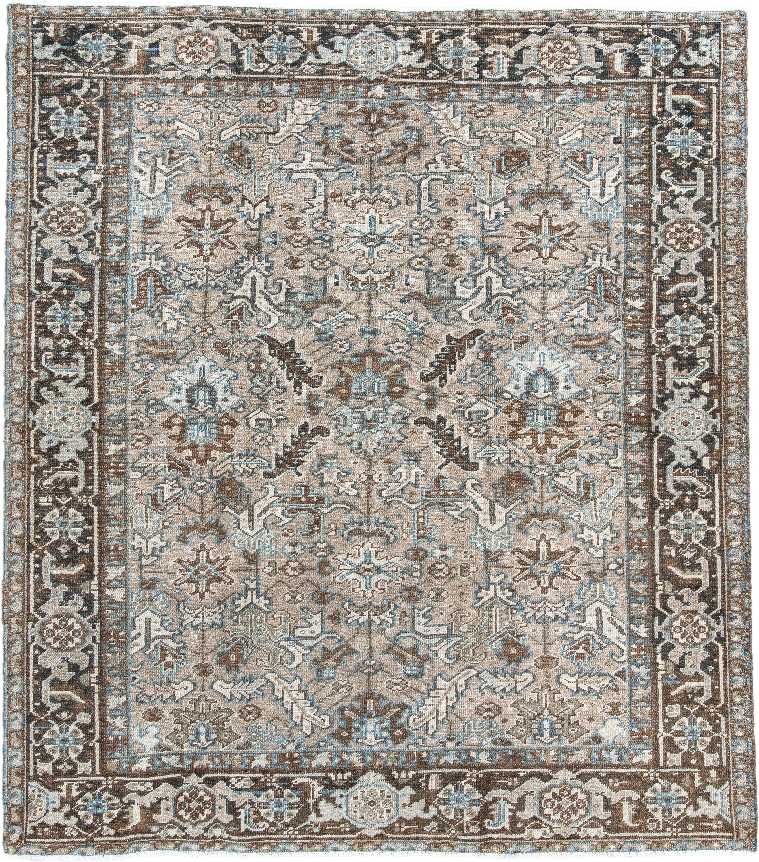 6' x 7' one-of-a-kind handmade antique Heriz rug. Color palette: taupe, brown, ivory, sky blue, charcoal, camel, beige, gray