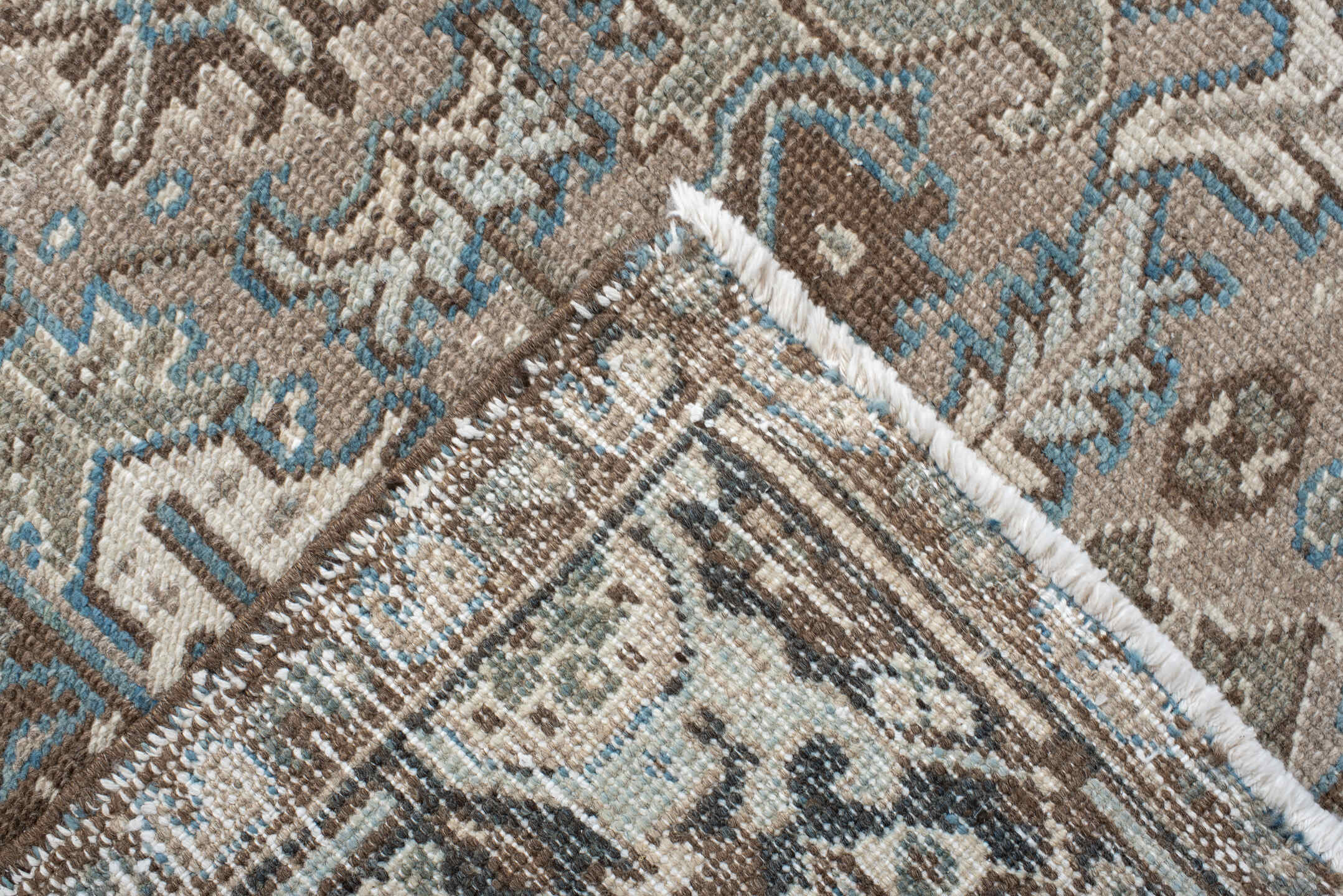 6' x 7' one-of-a-kind handmade antique Heriz rug. Color palette: taupe, brown, ivory, sky blue, charcoal, camel, beige, gray