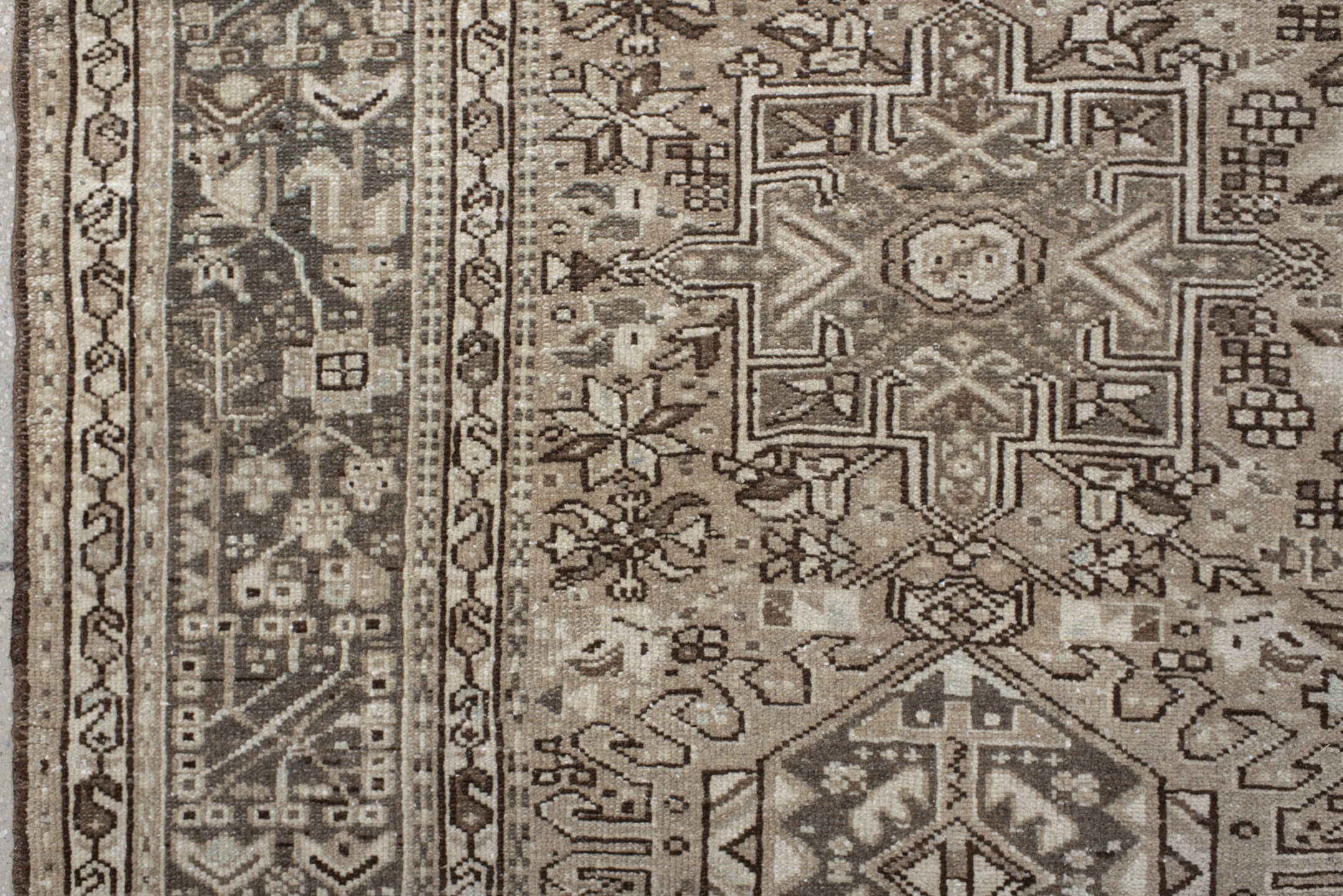 7' x 10' one-of-a-kind handmade vintage Karaje large size rug. Color palette: taupe, ivory, brown, rose, camel, charcoal