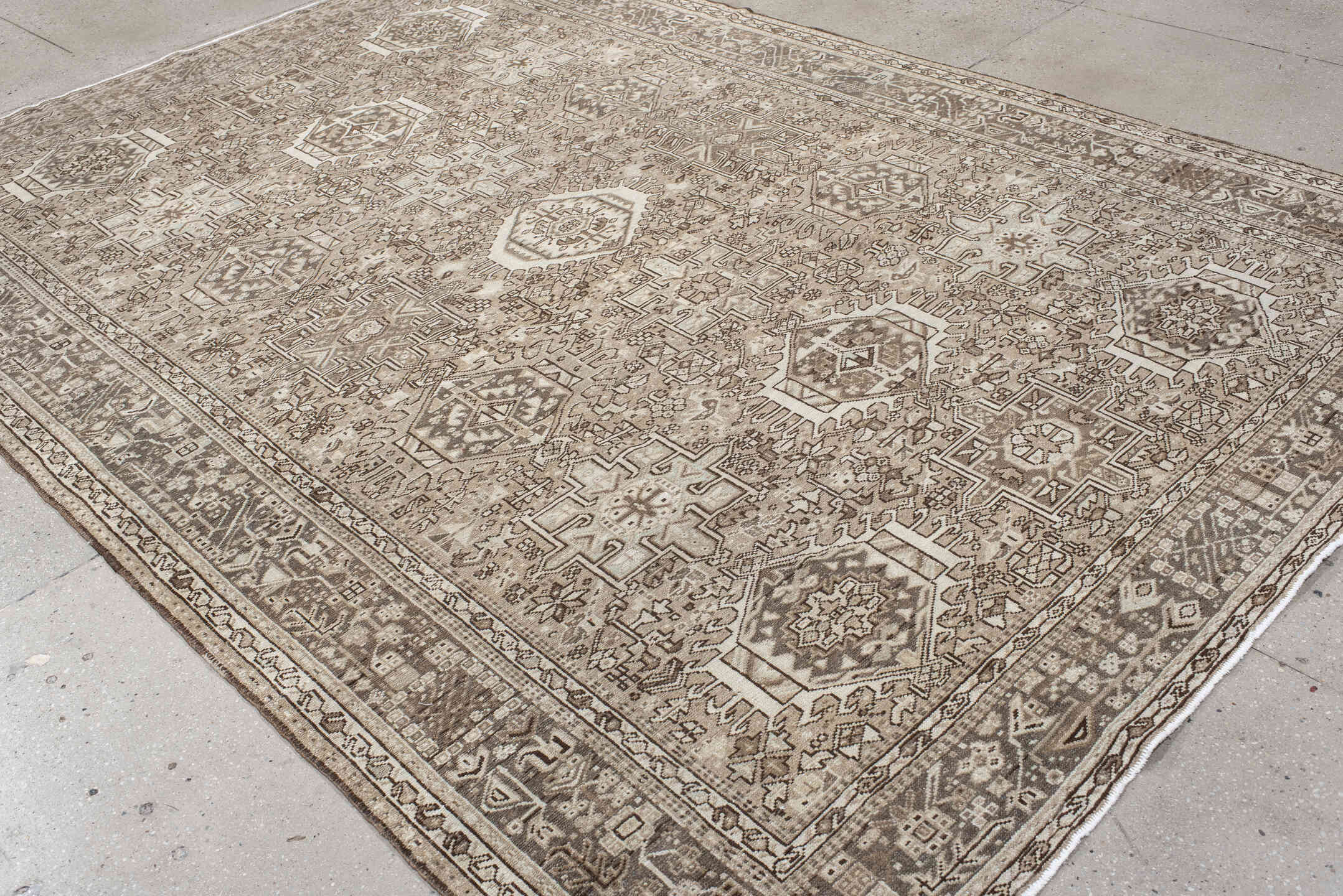 7' x 10' one-of-a-kind handmade vintage Karaje large size rug. Color palette: taupe, ivory, brown, rose, camel, charcoal