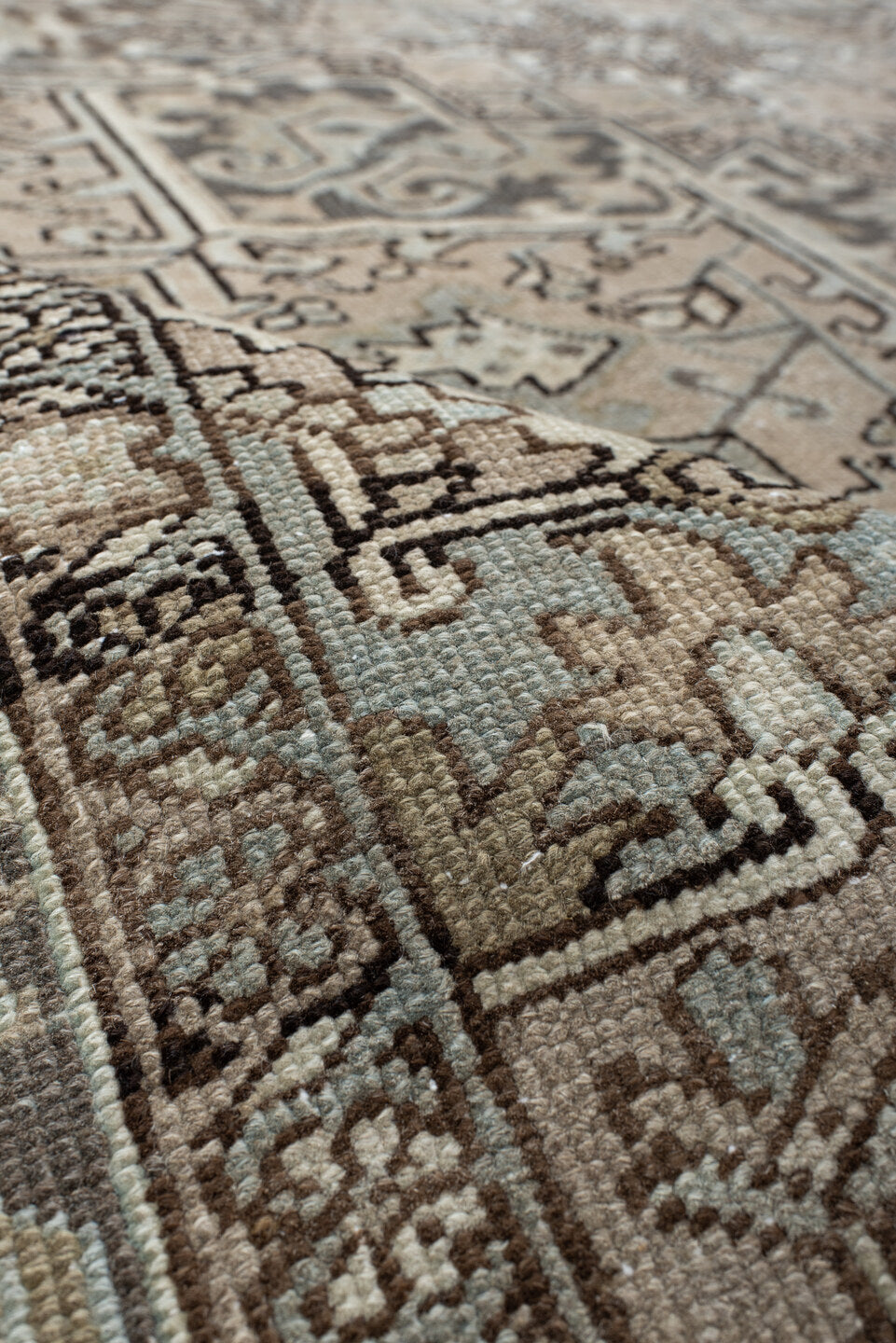 8' x 10' one-of-a-kind handmade antique Heriz large size rug. Color palette: ivory, taupe, charcoal, brown, slate, camel