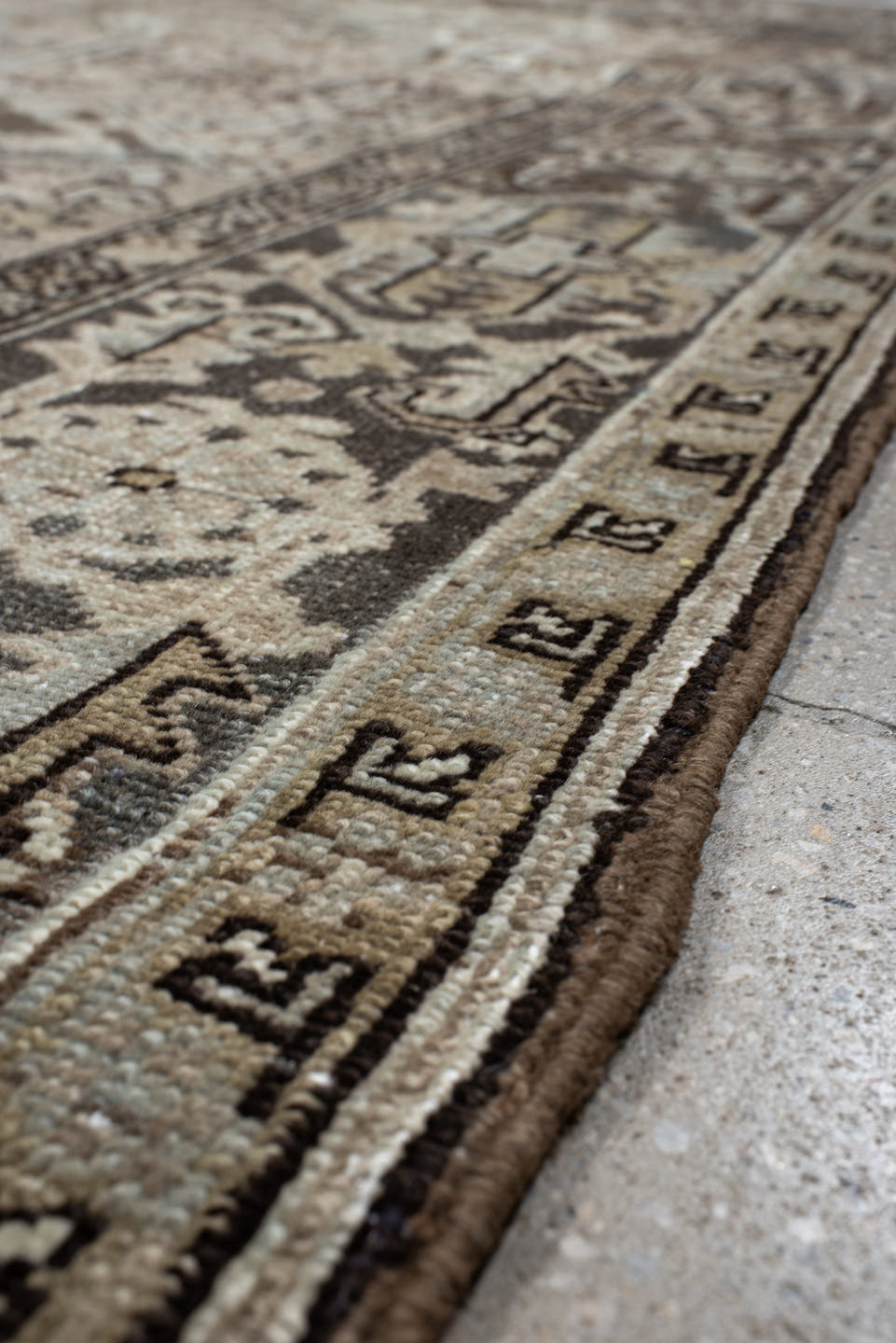 8' x 10' one-of-a-kind handmade antique Heriz large size rug. Color palette: ivory, taupe, charcoal, brown, slate, camel
