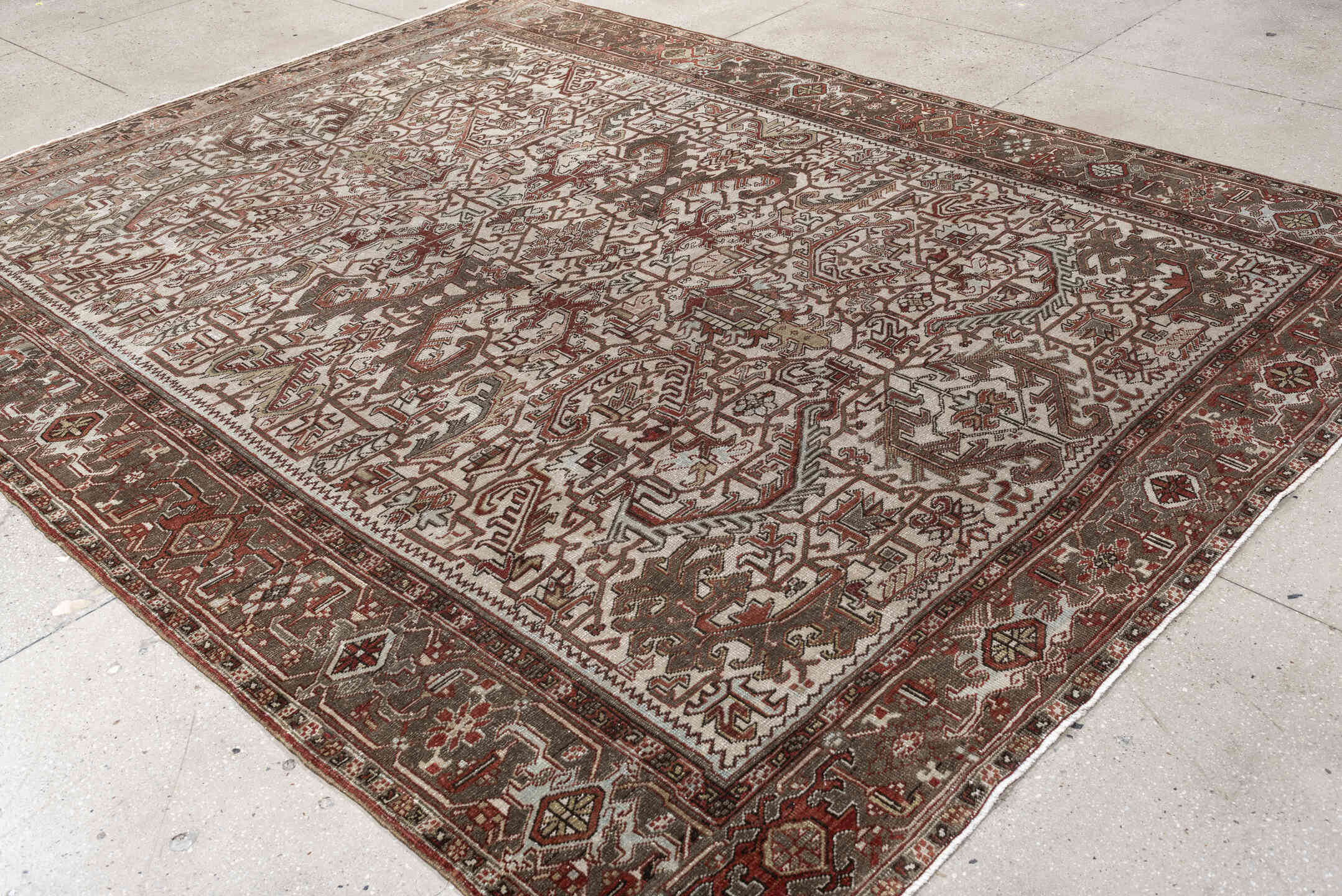 8' x 10' one-of-a-kind handmade vintage Heriz large size rug. Color palette: ivory, taupe, rust, charcoal, terra cotta