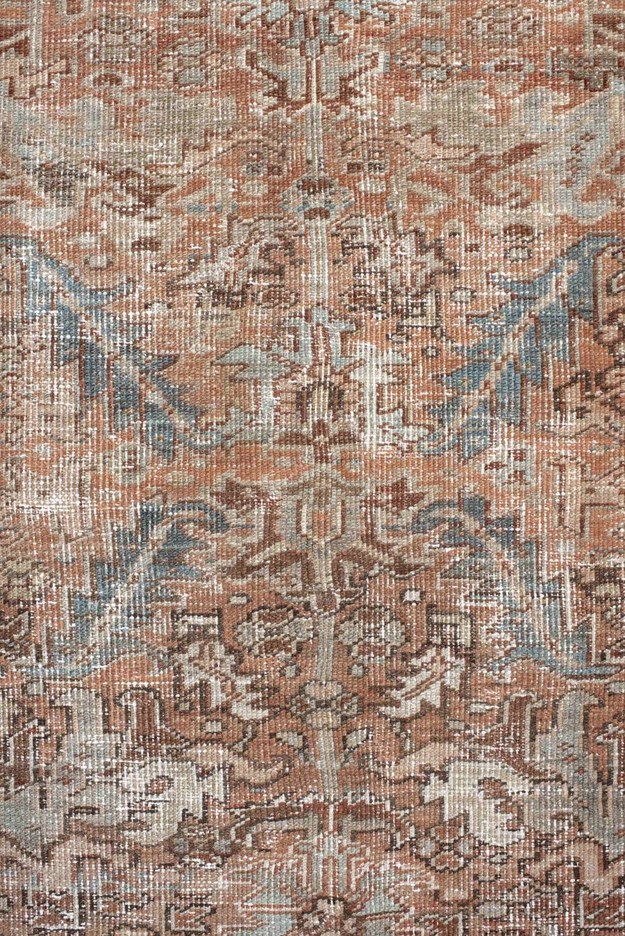 6' x 8' one-of-a-kind handmade antique Heriz medium size rug. Color palette: terra cotta, ivory, soft blue, taupe, rust