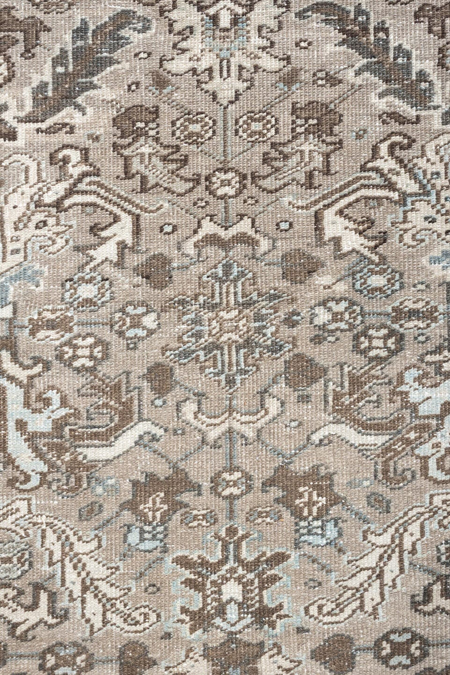 7' x 9' one-of-a-kind handmade vintage Heriz rug. Color palette: taupe, brown, ivory, pale blue, camel, charcoal, beige