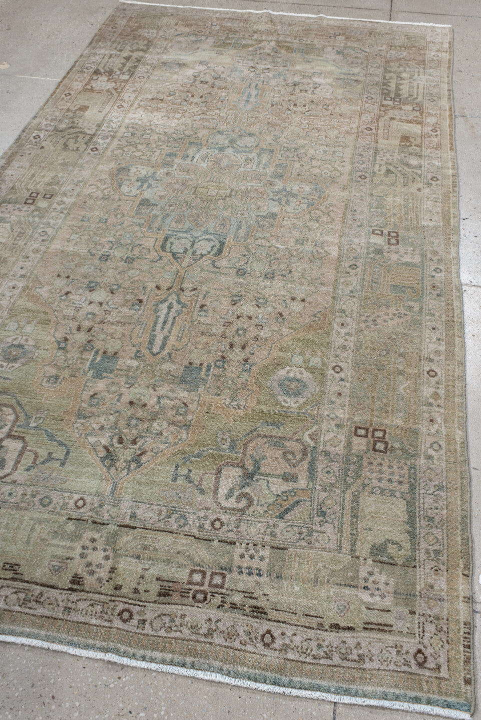5' x 9' one-of-a-kind handmade antique Malayer medium size rug. Color palette: ivory, taupe, pale blue, beige, camel