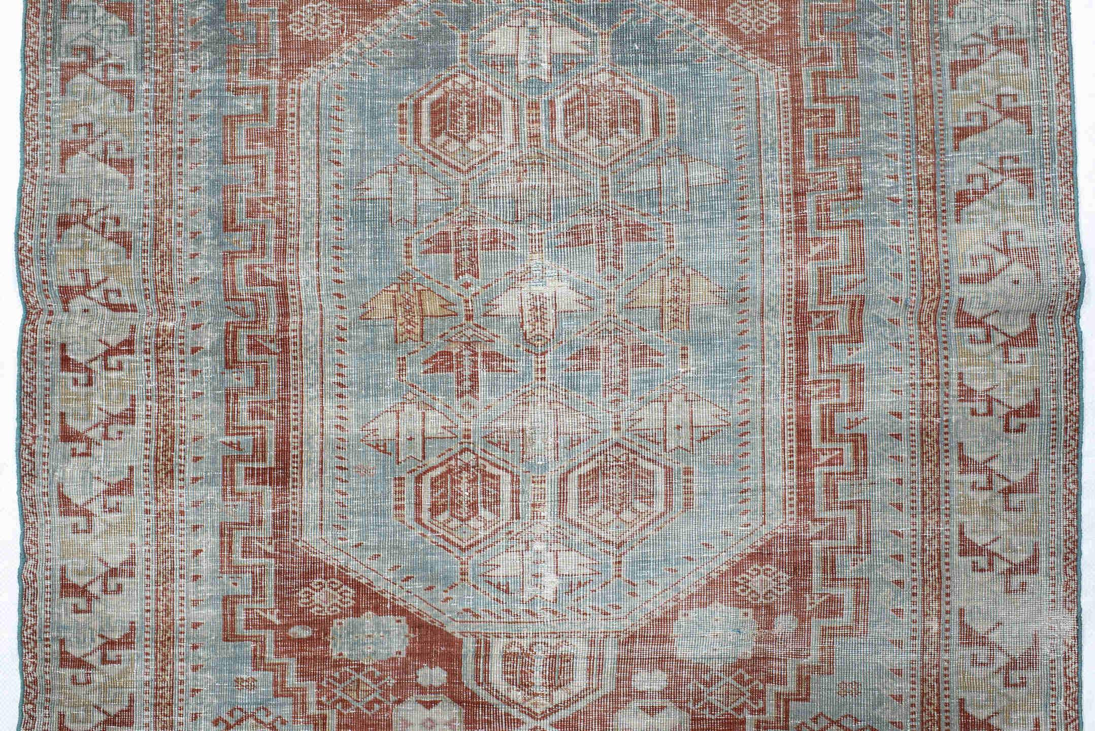 3' x 4' one-of-a-kind handmade antique Shirvan small size rug. Color palette: pale blue, rust, ivory, sage, taupe
