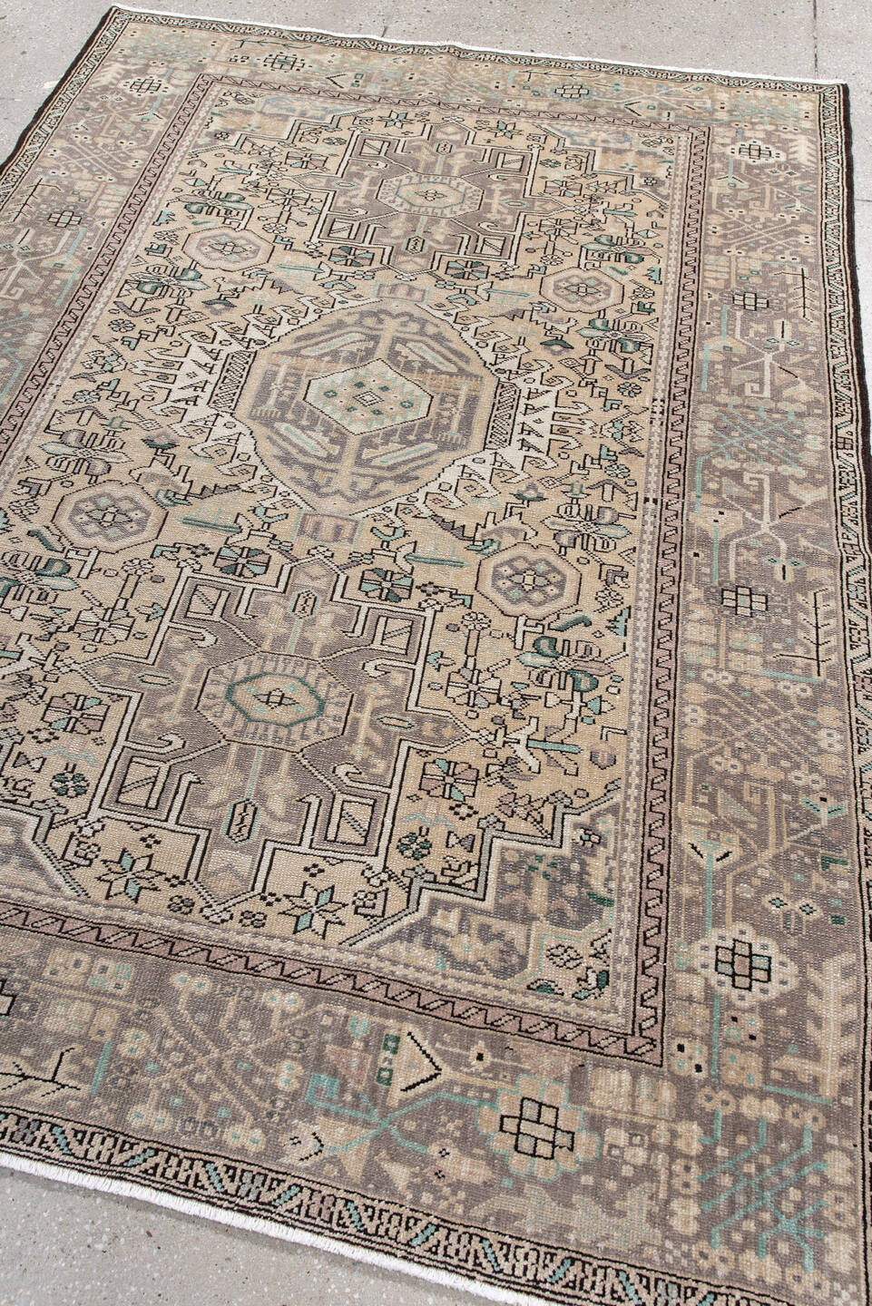 5' x 6' one-of-a-kind handmade vintage Karaje rug. Color palette: black, blue, brown, gainsboro, gray, light gray, off-white