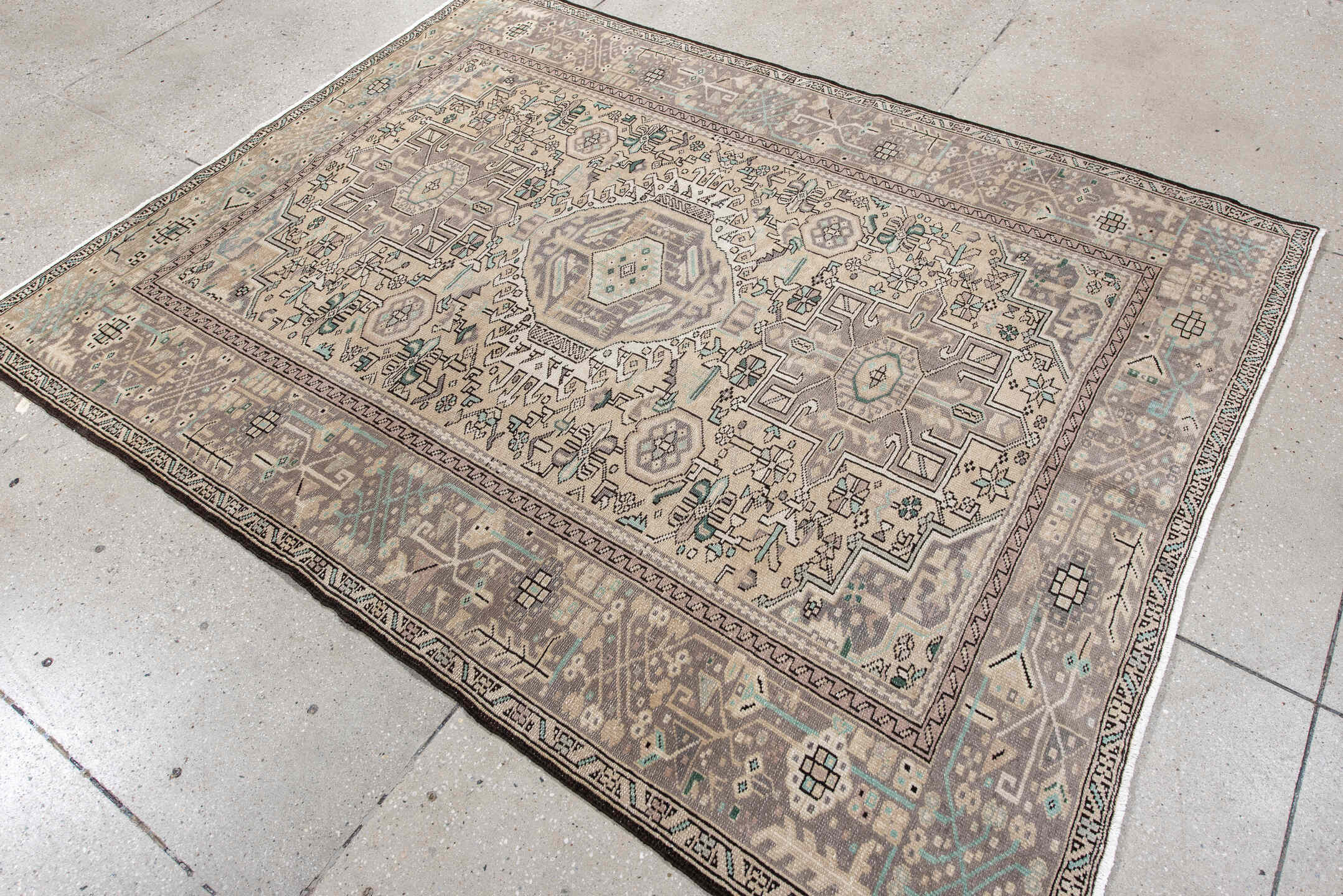 5' x 6' one-of-a-kind handmade vintage Karaje rug. Color palette: ivory, taupe, charcoal, aqua, gray, cream, beige, black