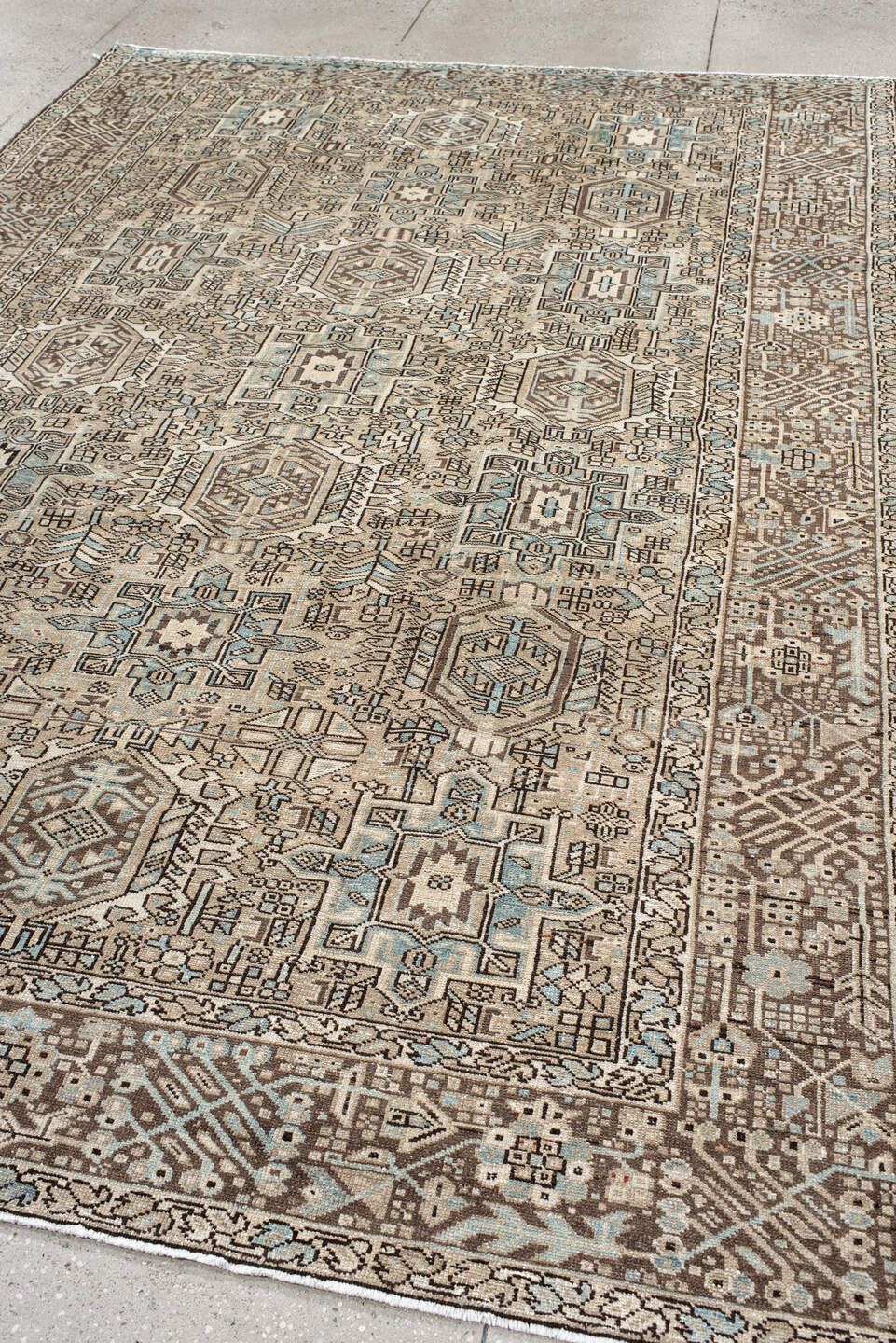 7' x 11' one-of-a-kind handmade antique Karaje large size rug. Color palette: ivory, brown, sky blue, taupe, camel