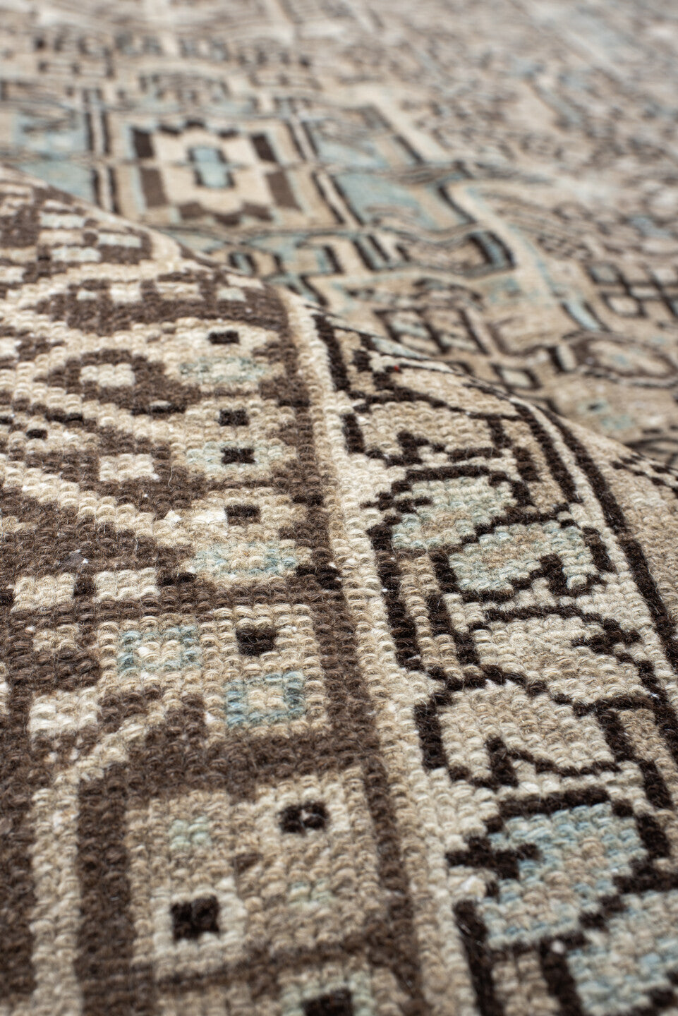 7' x 11' one-of-a-kind handmade antique Karaje large size rug. Color palette: ivory, brown, sky blue, taupe, camel