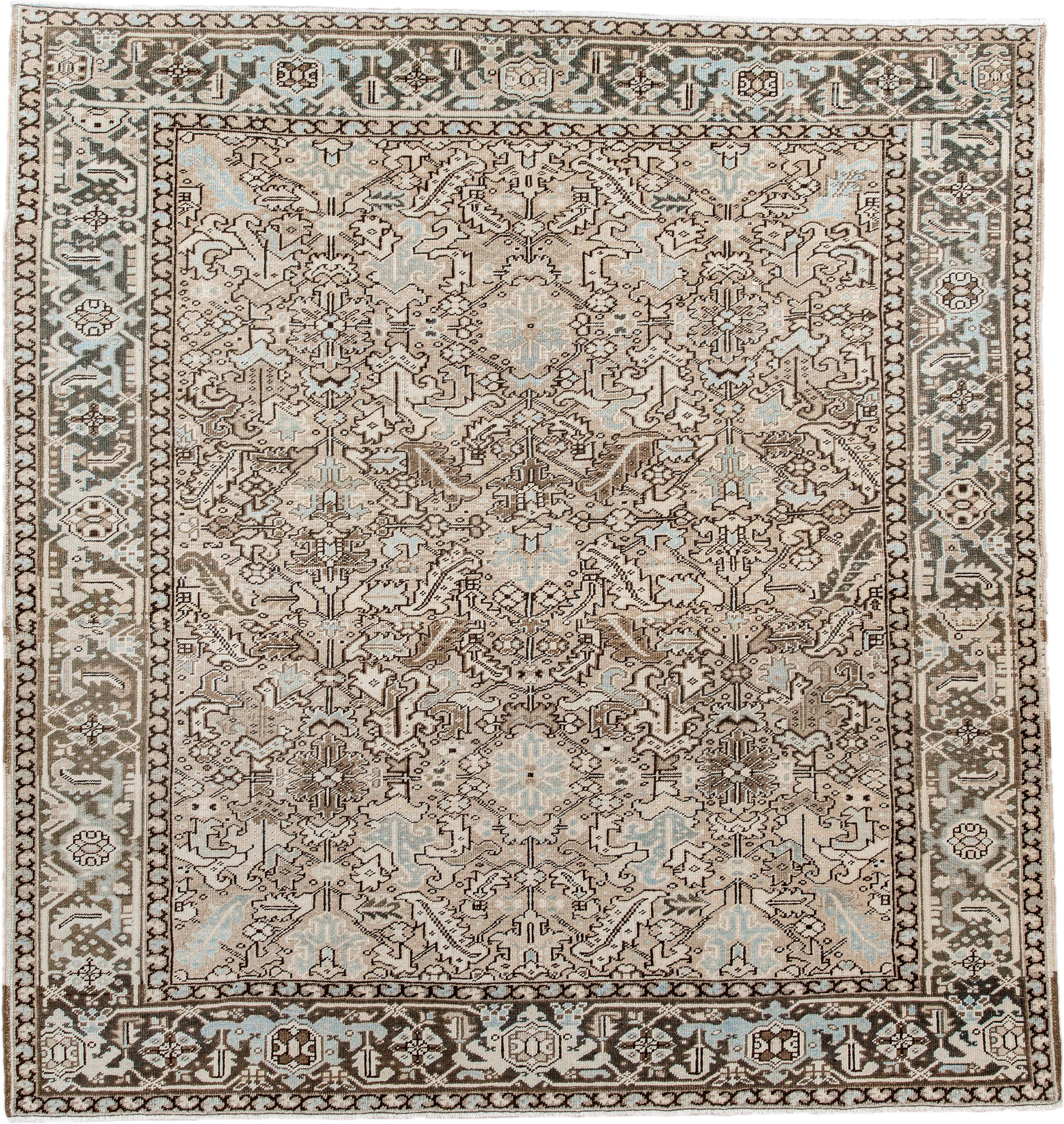 7' x 8' one-of-a-kind handmade antique Heriz rug. Color palette: ivory, taupe, brown, camel, pale blue, charcoal, beige