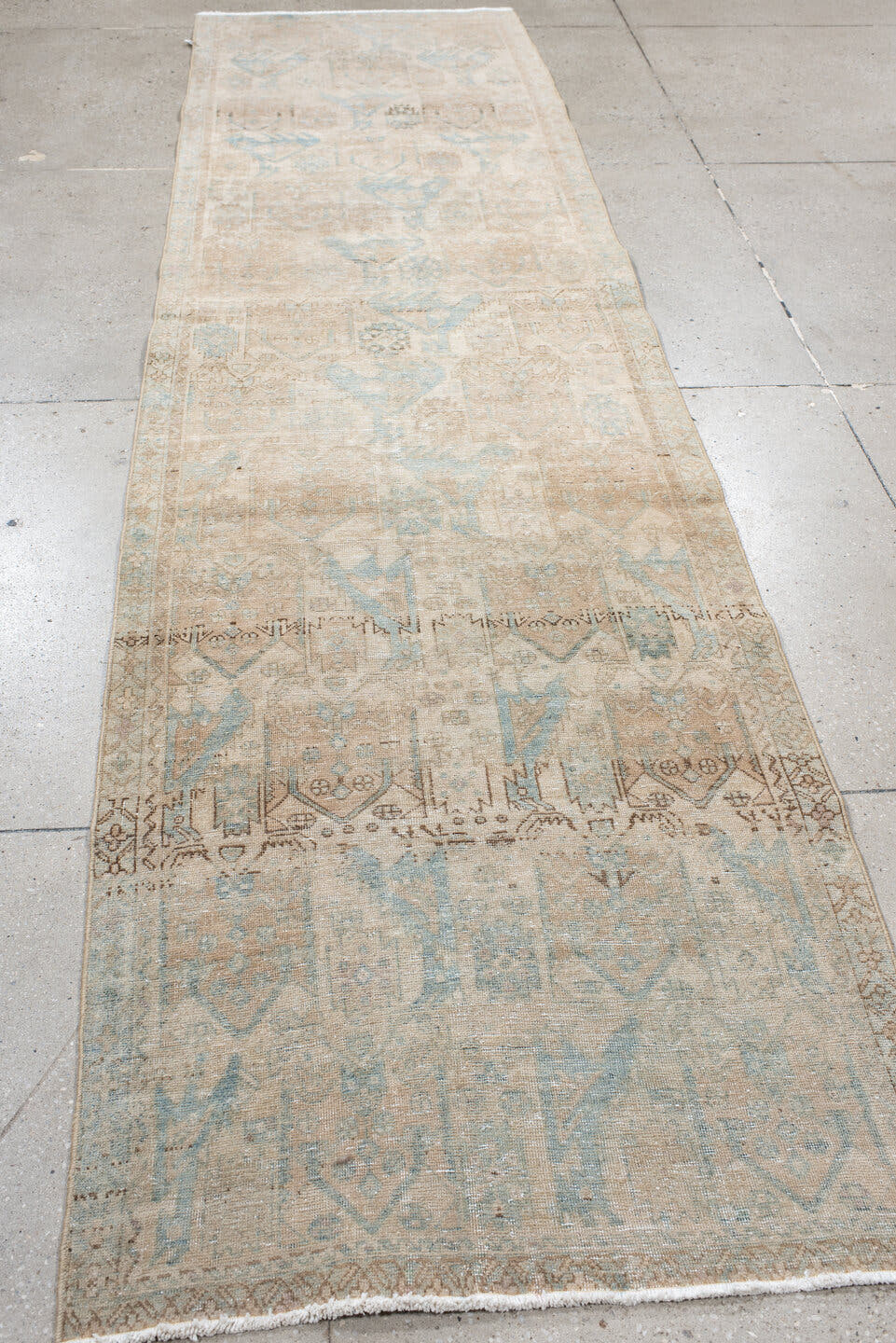3' x 11' one-of-a-kind handmade antique Sarab runner rug. Color palette: ivory, beige, pale blue, taupe, camel, brown