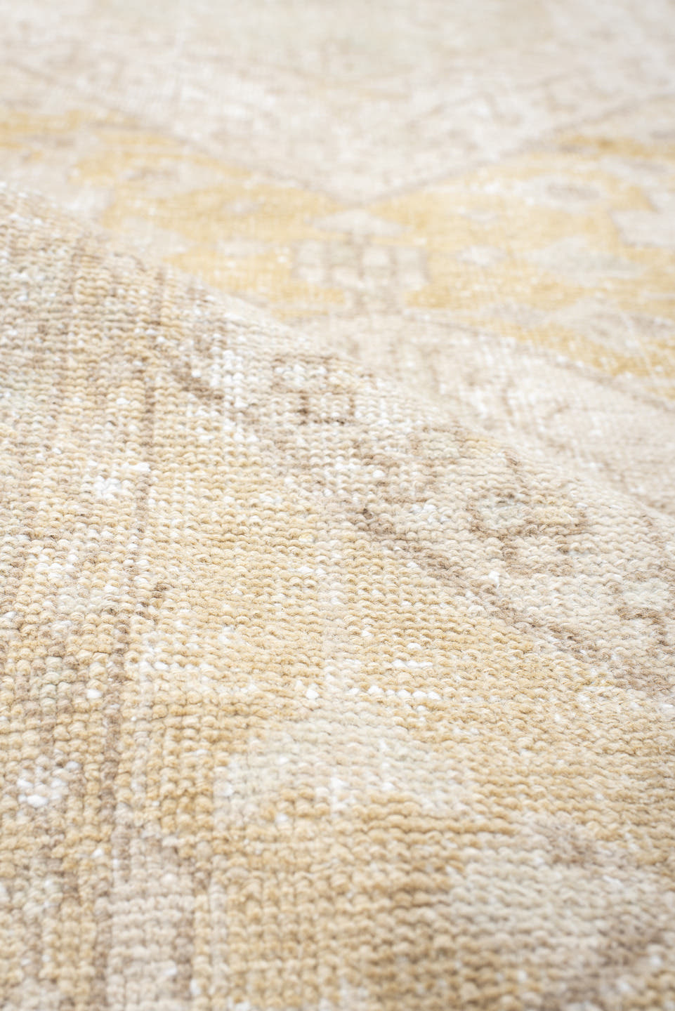 2' x 10' one-of-a-kind handmade vintage Karaje runner rug. Color palette: ivory, sand, cream, pale gold, taupe, sage, beige