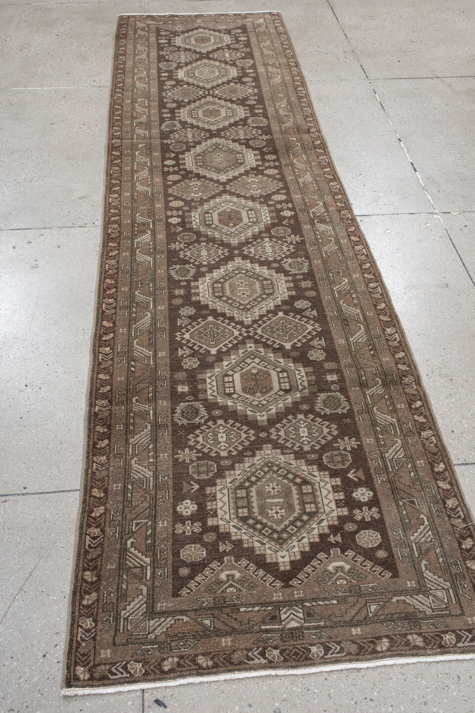 2' x 10' one-of-a-kind handmade vintage Sivas runner rug. Color palette: brown, gray, light gray, off-white, pink