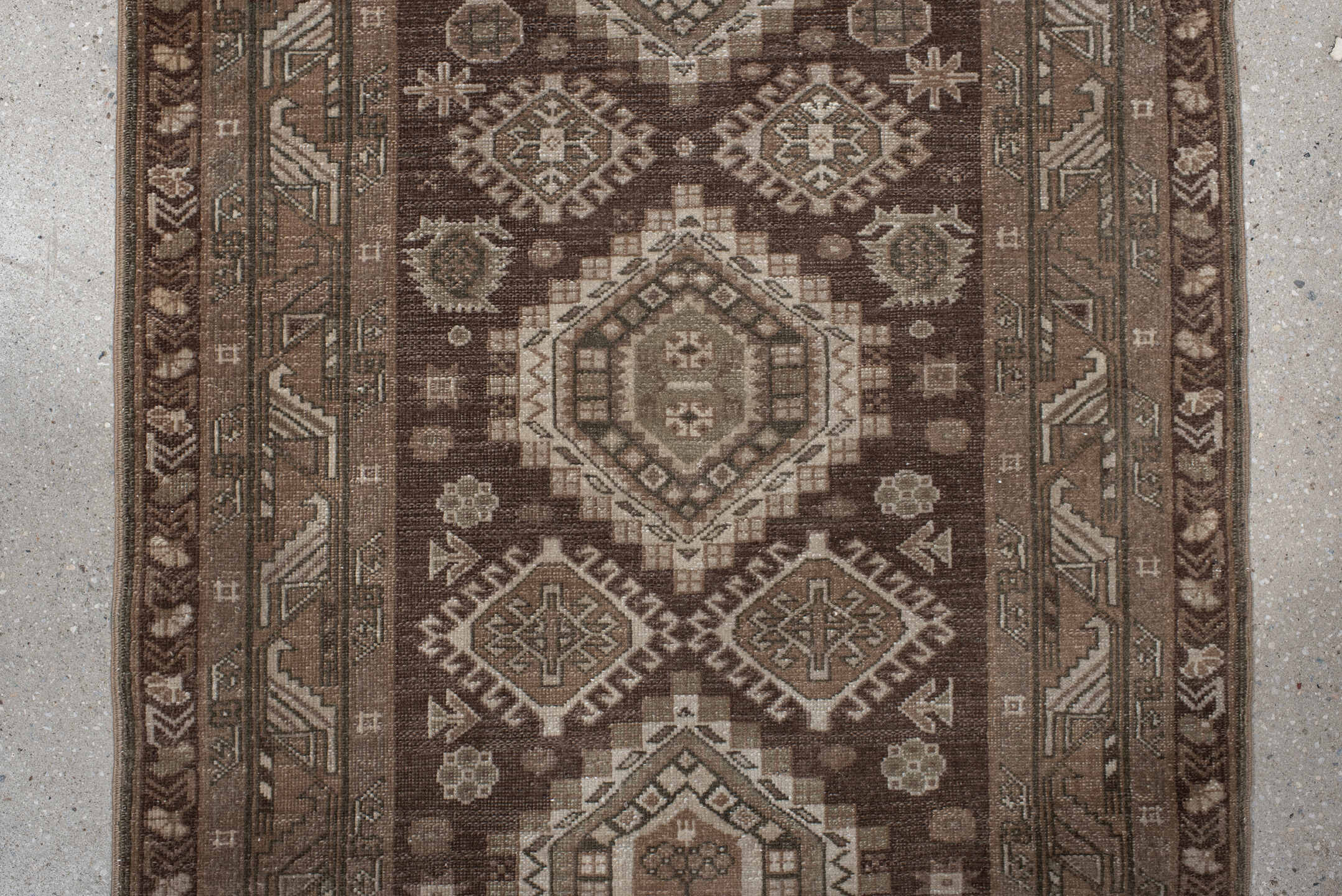 2' x 10' one-of-a-kind handmade vintage Sivas runner rug. Color palette: brown, gray, light gray, off-white, pink