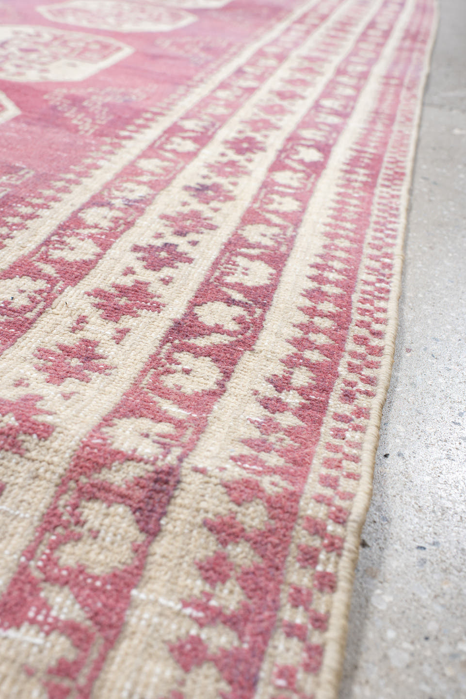 3' x 10' one-of-a-kind handmade vintage Afghan runner rug. Color palette: rose, ivory, dusty pink, burgundy, pink, red