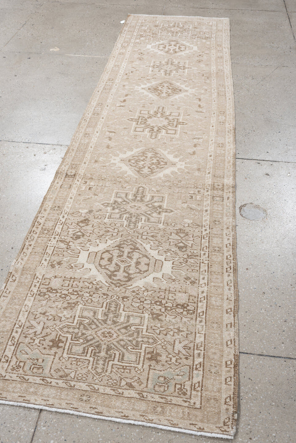 2' x 9' one-of-a-kind handmade antique Karaje runner rug. Color palette: ivory, taupe, sand, beige, camel, light brown, gray