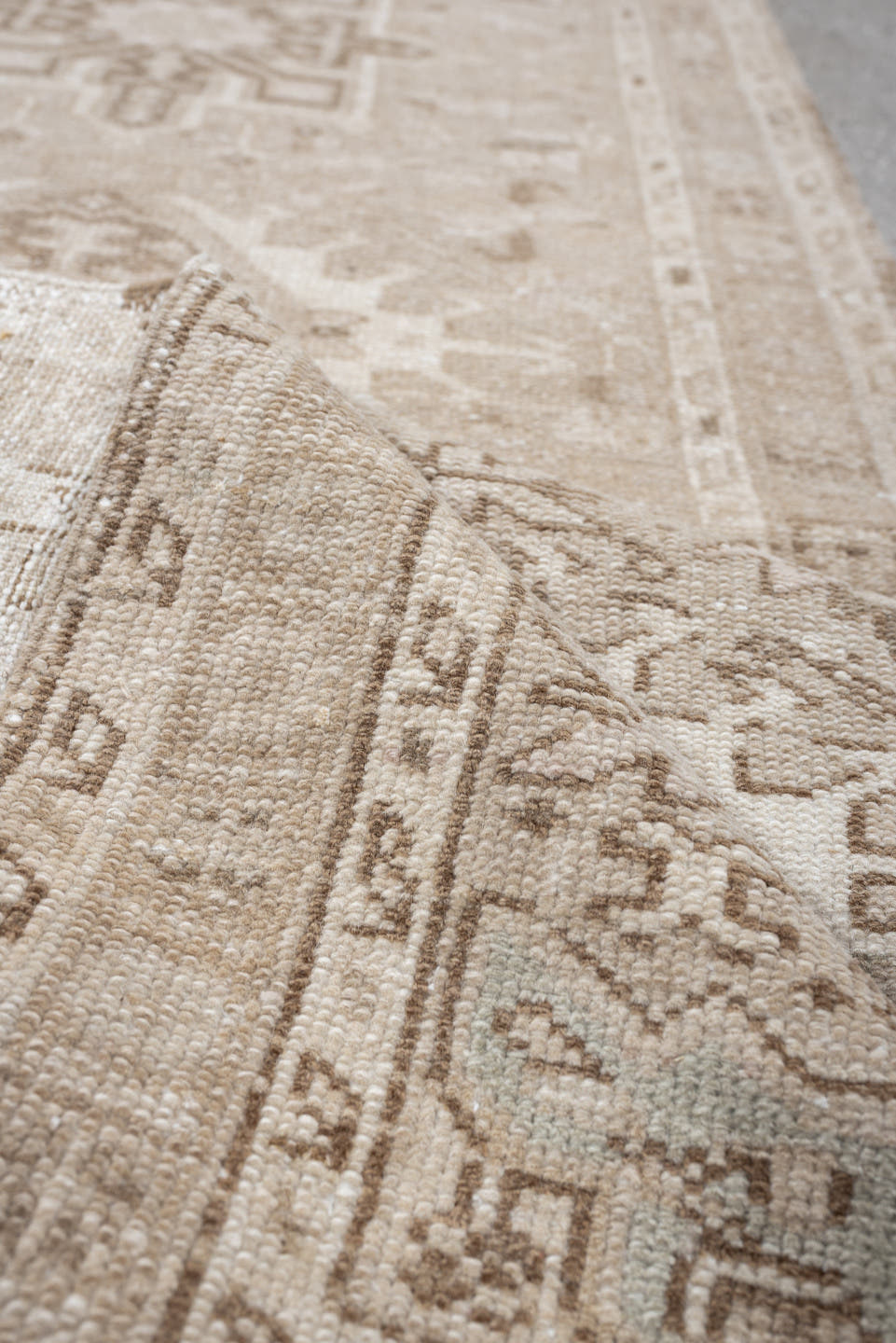 2' x 9' one-of-a-kind handmade antique Karaje runner rug. Color palette: ivory, taupe, sand, beige, camel, light brown, gray