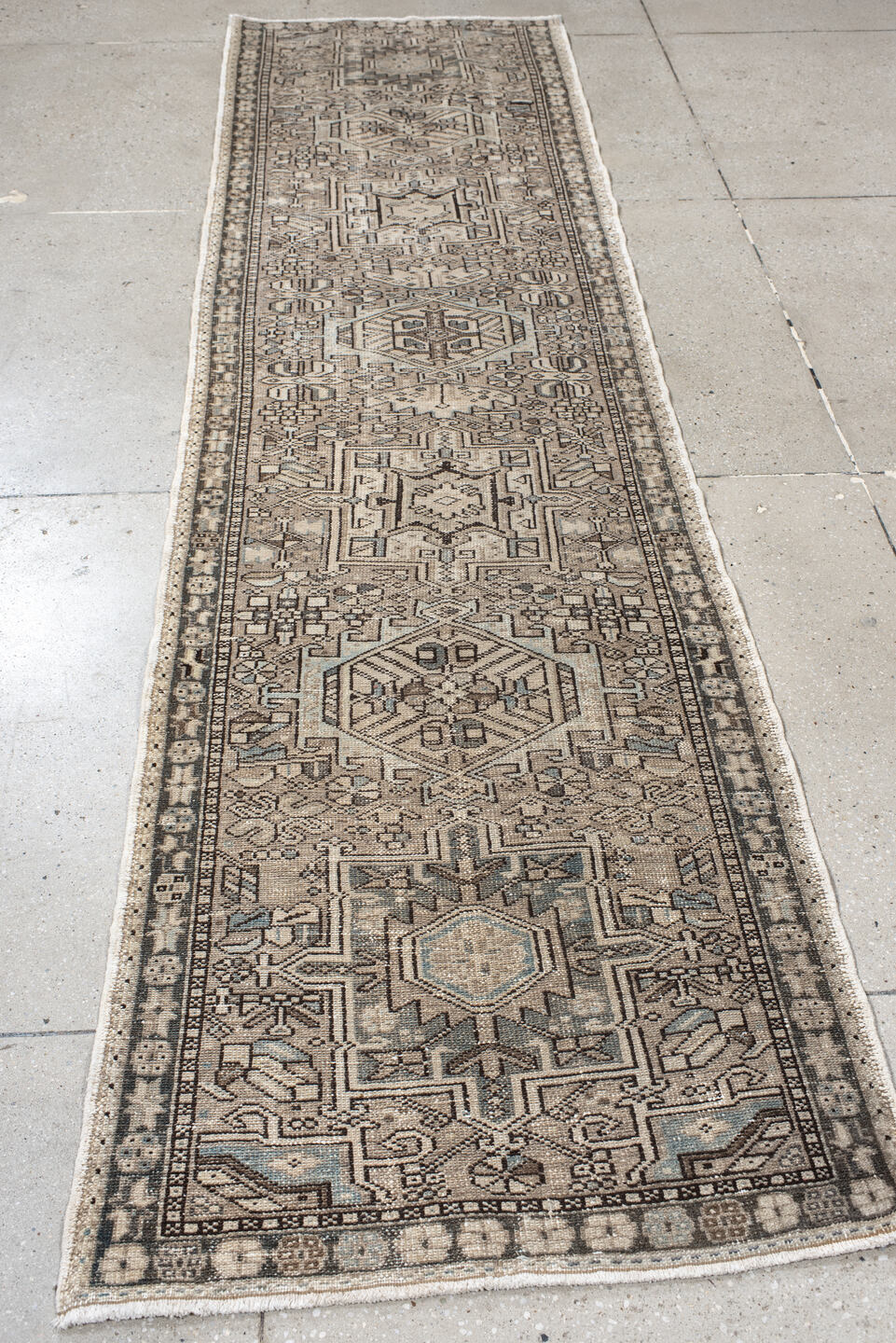 2' x 10' one-of-a-kind handmade vintage Karaje runner rug. Color palette: black, gray, light gray, off-white