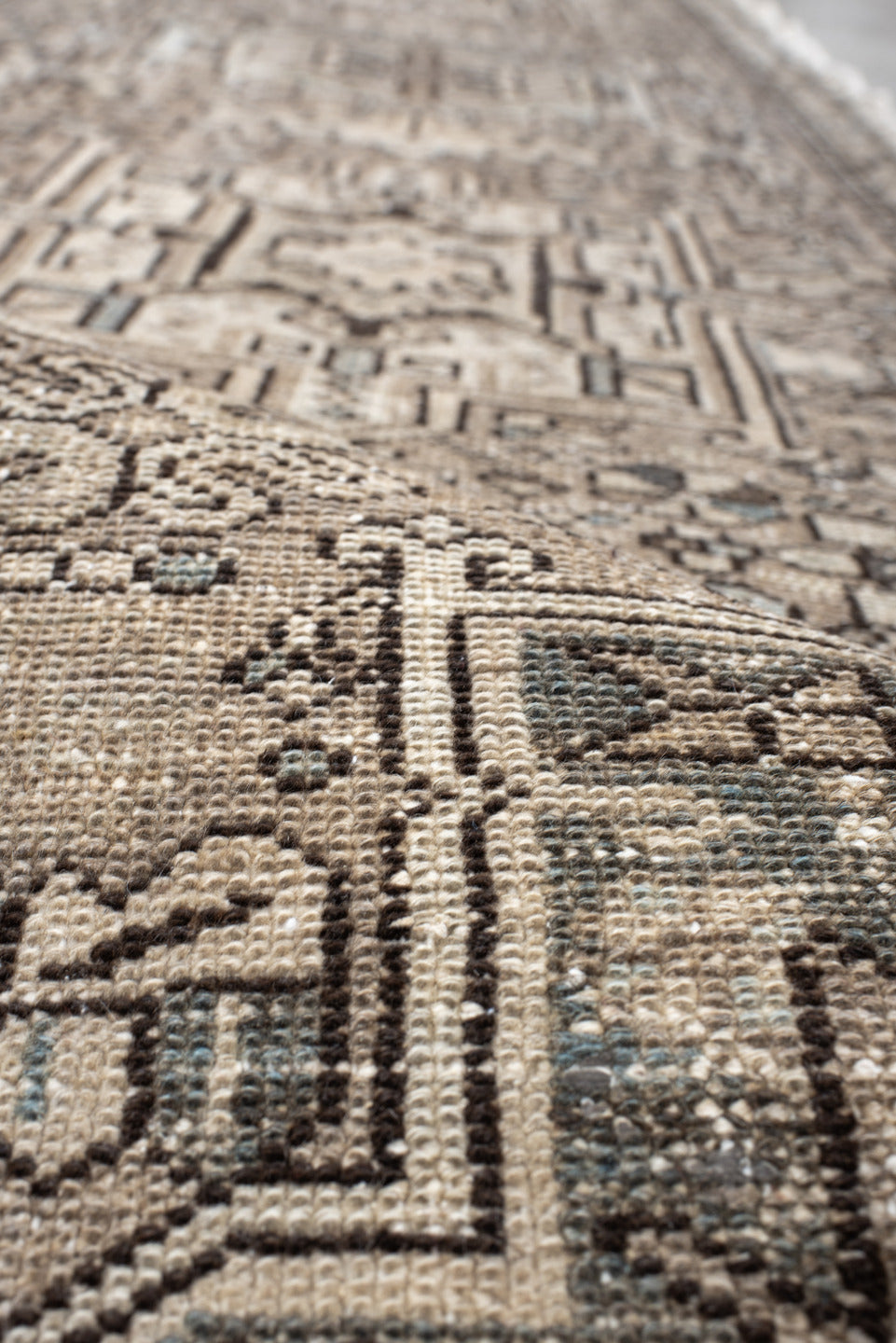 2' x 10' one-of-a-kind handmade vintage Karaje runner rug. Color palette: black, gray, off-white, light gray