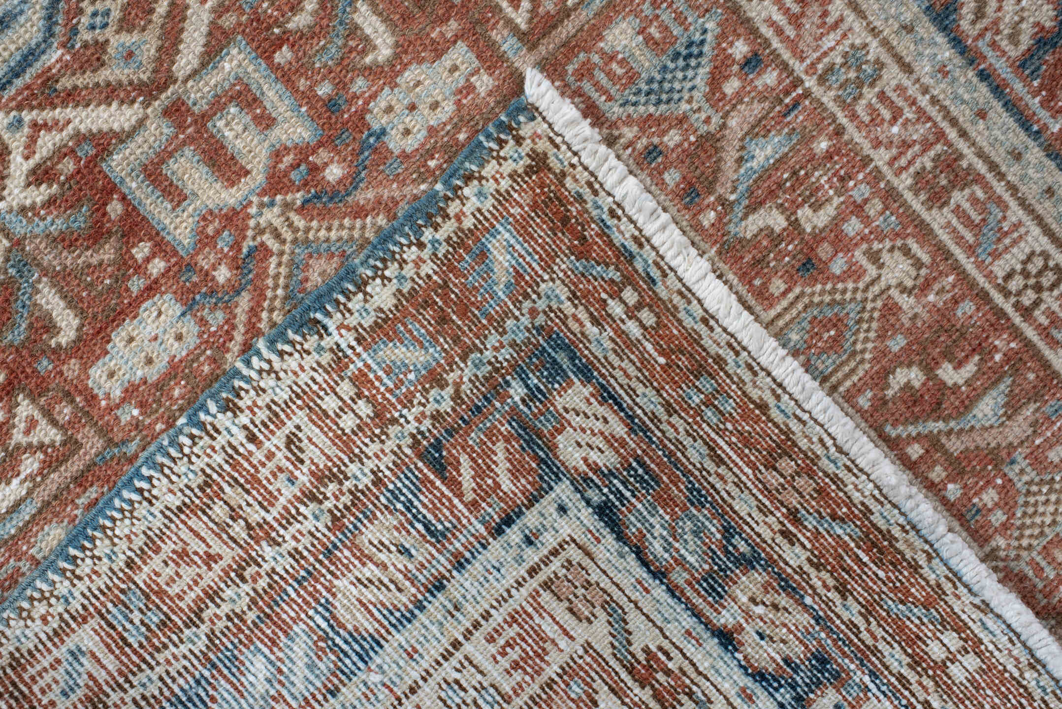 3' x 11' one-of-a-kind handmade antique Karaje runner rug. Color palette: terra cotta, ivory, sky blue, rust, camel, slate