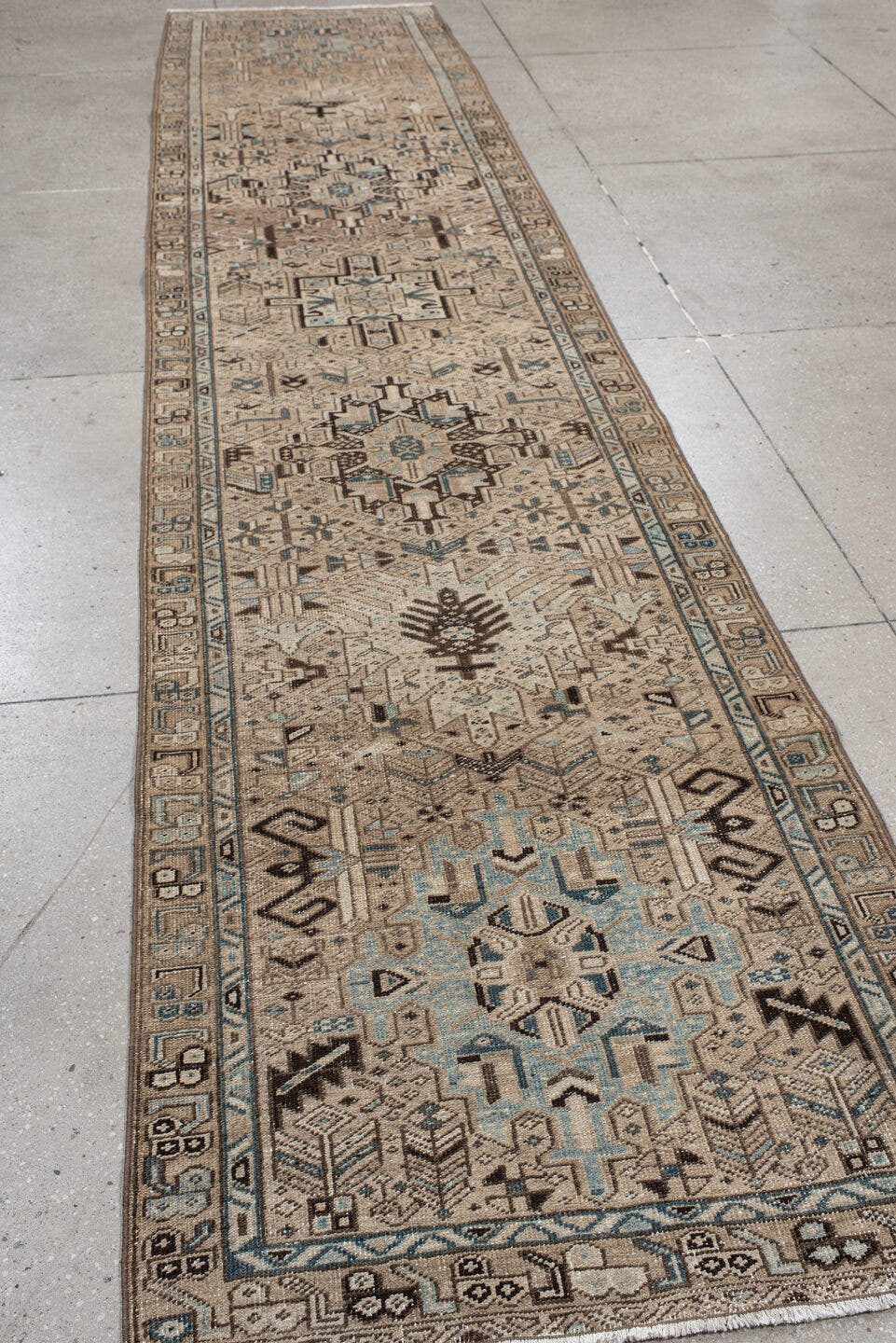 3' x 14' one-of-a-kind handmade antique Karaje runner rug. Color palette: ivory, sky blue, taupe, camel, charcoal, brown