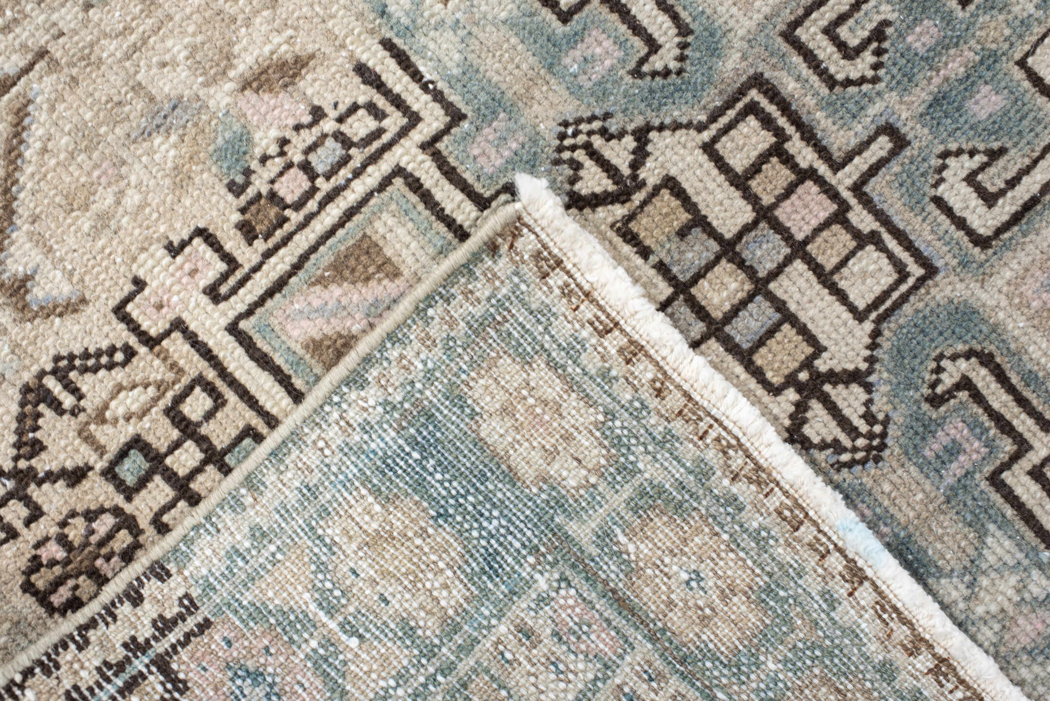 3' x 12' one-of-a-kind handmade vintage Karaje runner rug. Color palette: black, dim gray, gray, light gray, off-white, pink