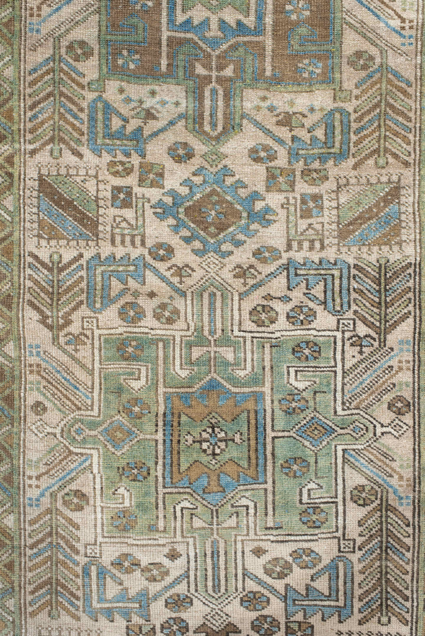 3' x 9' one-of-a-kind handmade vintage Heriz runner rug. Color palette: ivory, sky blue, taupe, brown, sage, charcoal