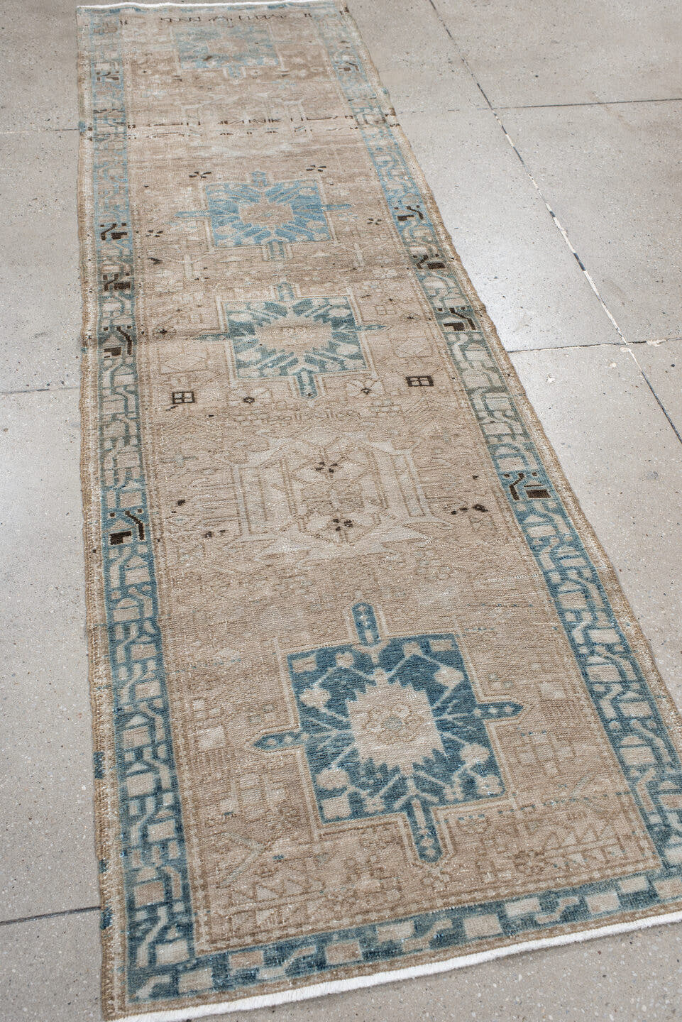 2' x 9' one-of-a-kind handmade antique Karaje runner rug. Color palette: taupe, ivory, sky blue, charcoal, beige, gray