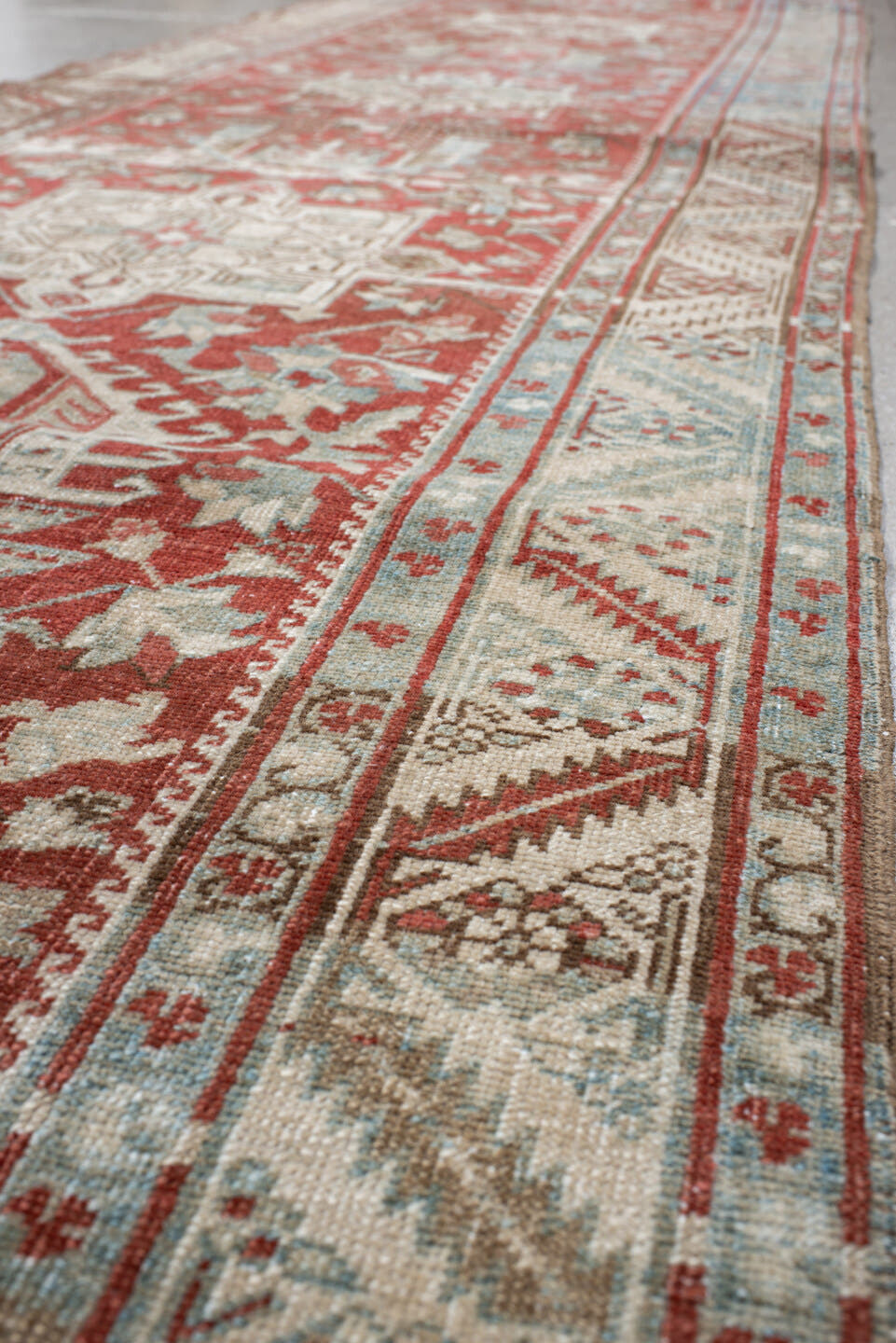 0' x 0' one-of-a-kind handmade vintage Heriz small size rug. Color palette: rust, ivory, pale blue, brick, cream, taupe