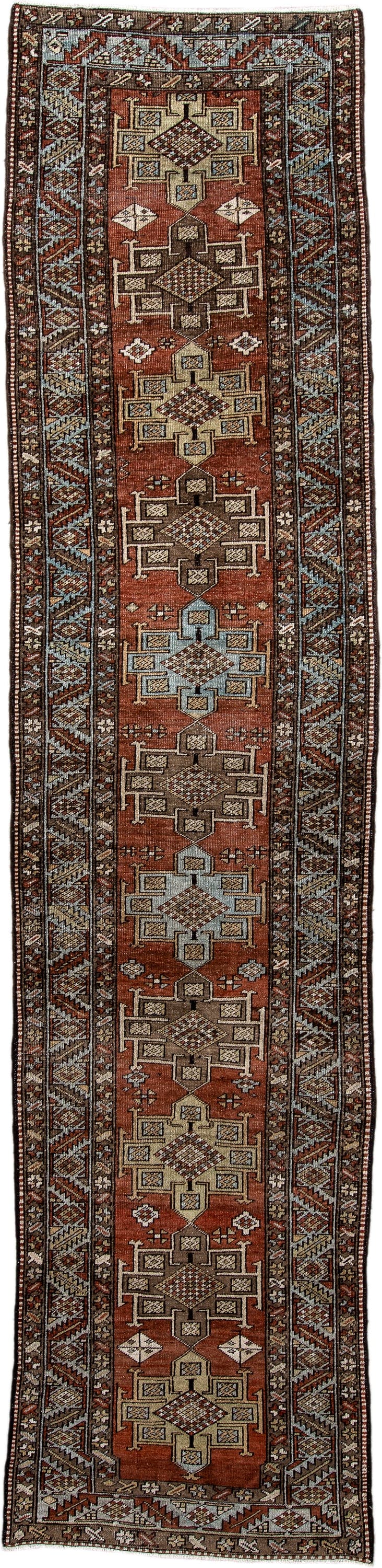 3' x 12' one-of-a-kind handmade antique Heriz runner rug. Color palette: rust, brown, ivory, sky blue, taupe, charcoal