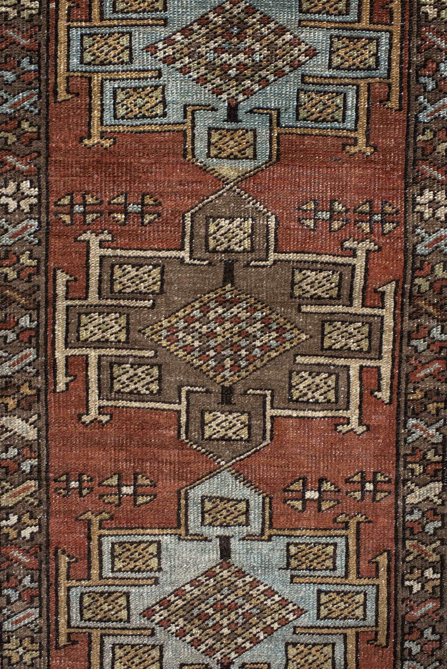 3' x 12' one-of-a-kind handmade antique Heriz runner rug. Color palette: rust, brown, ivory, sky blue, taupe, charcoal