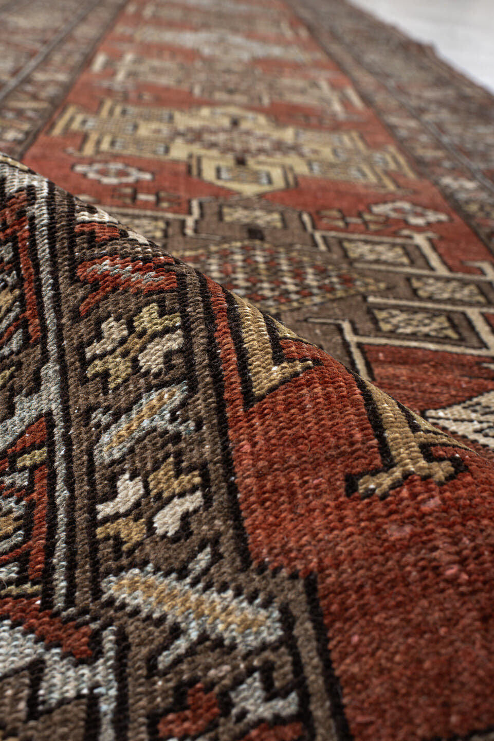 3' x 12' one-of-a-kind handmade antique Heriz runner rug. Color palette: rust, brown, ivory, sky blue, taupe, charcoal