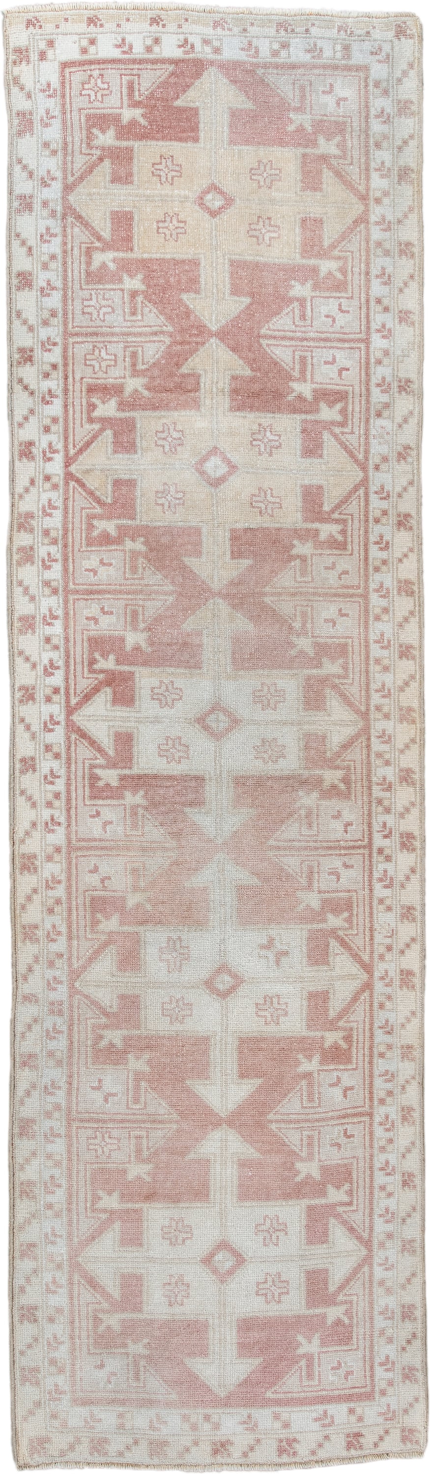 3' x 6' one-of-a-kind handmade antique runner rug. Color palette: ivory, blush, rust, cream, sand, pink, terracotta, brown