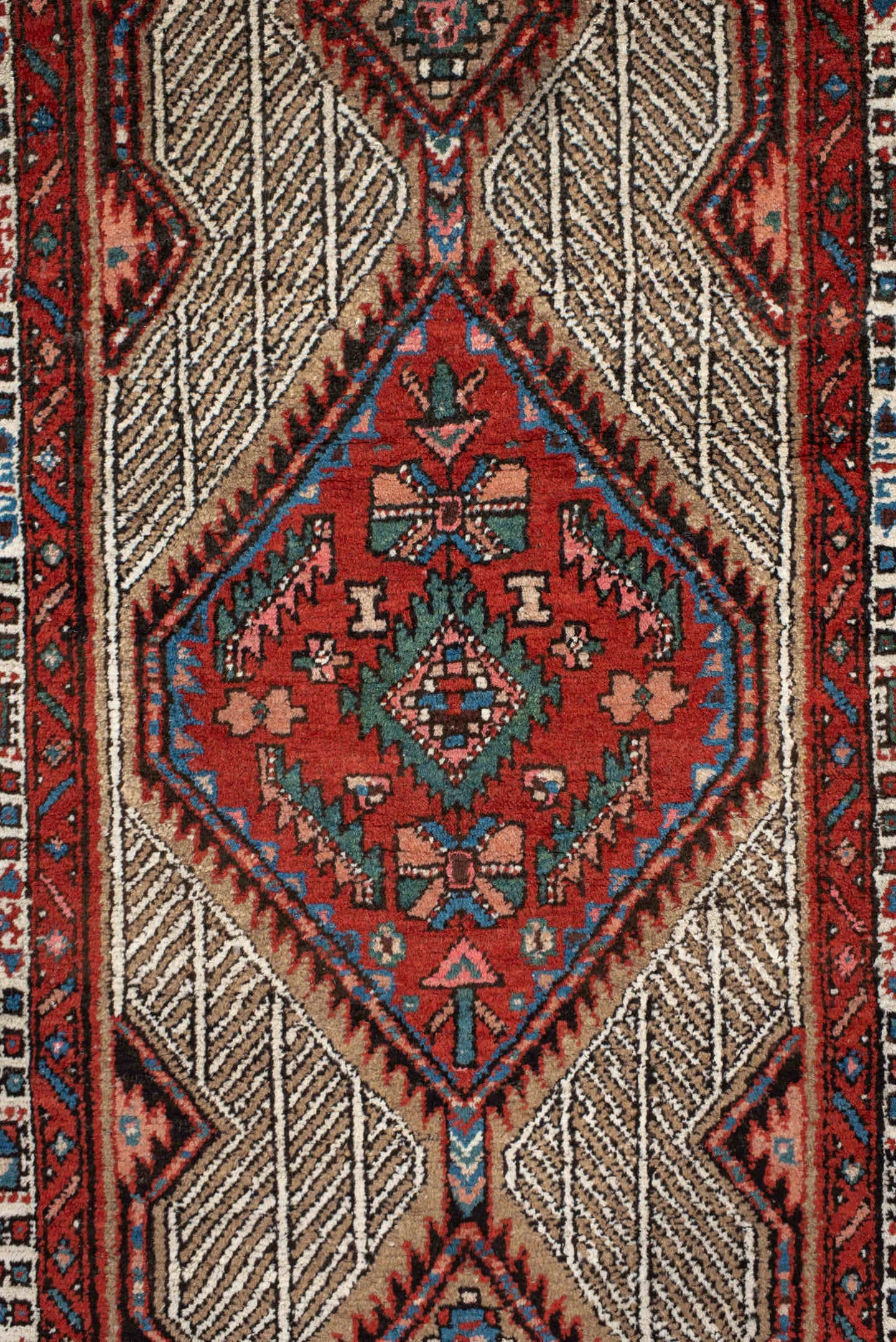 2' x 8' one-of-a-kind handmade antique Sarab runner rug. Color palette: ivory, rust, indigo, camel, rose, charcoal, sky_blue