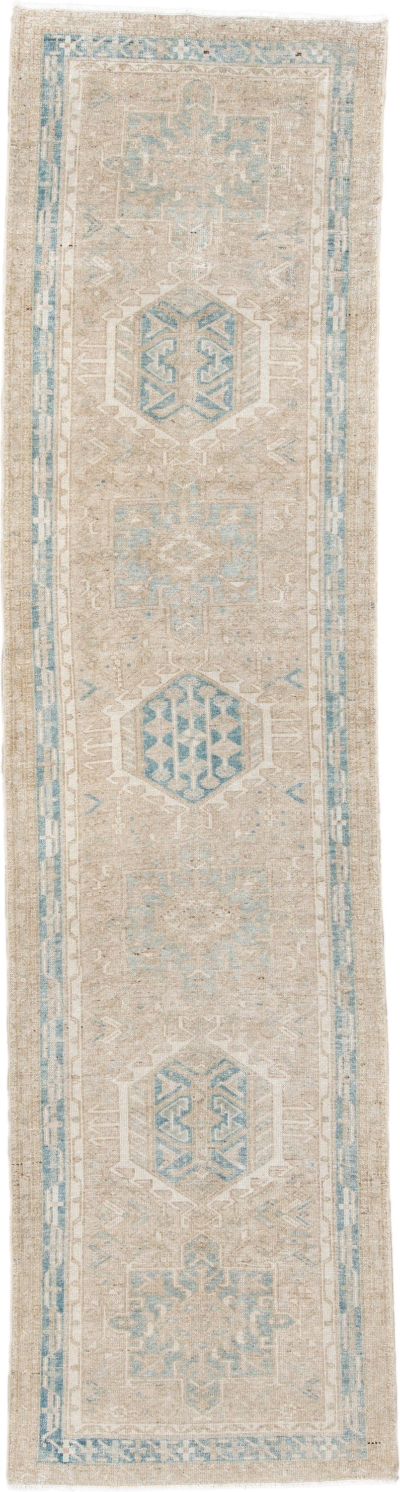 2' x 11' one-of-a-kind handmade antique Karaje runner rug. Color palette: ivory, pale blue, beige, taupe, cream, light blue