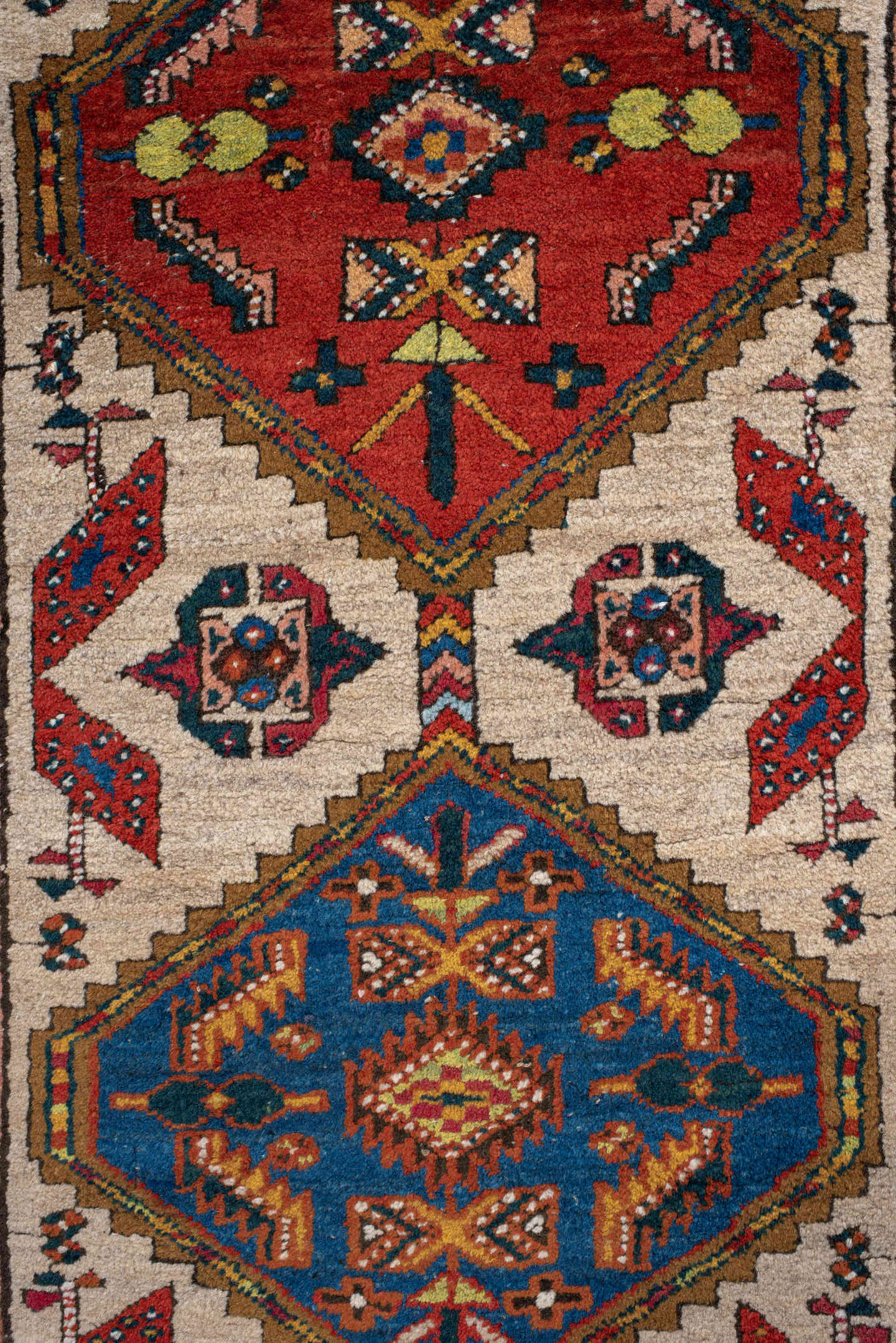 3' x 7' one-of-a-kind handmade antique Sarab runner rug. Color palette: ivory, indigo, rust, camel, navy, coral, gold, sage