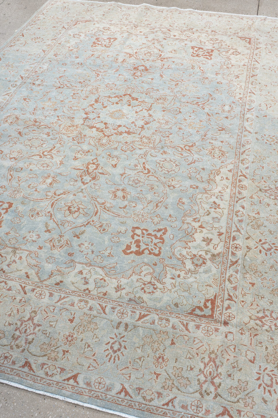 6' x 8' one-of-a-kind handmade antique Sarouk medium size rug. Color palette: ivory, pale blue, blush, peach, taupe