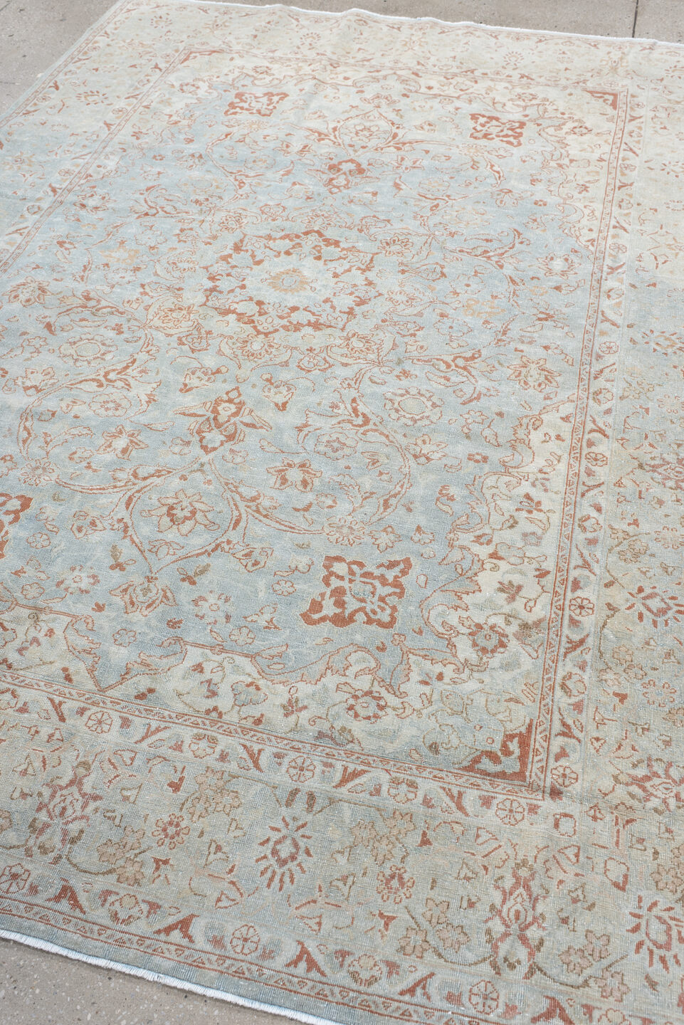 6' x 8' one-of-a-kind handmade antique Sarouk medium size rug. Color palette: ivory, pale blue, blush, peach, taupe