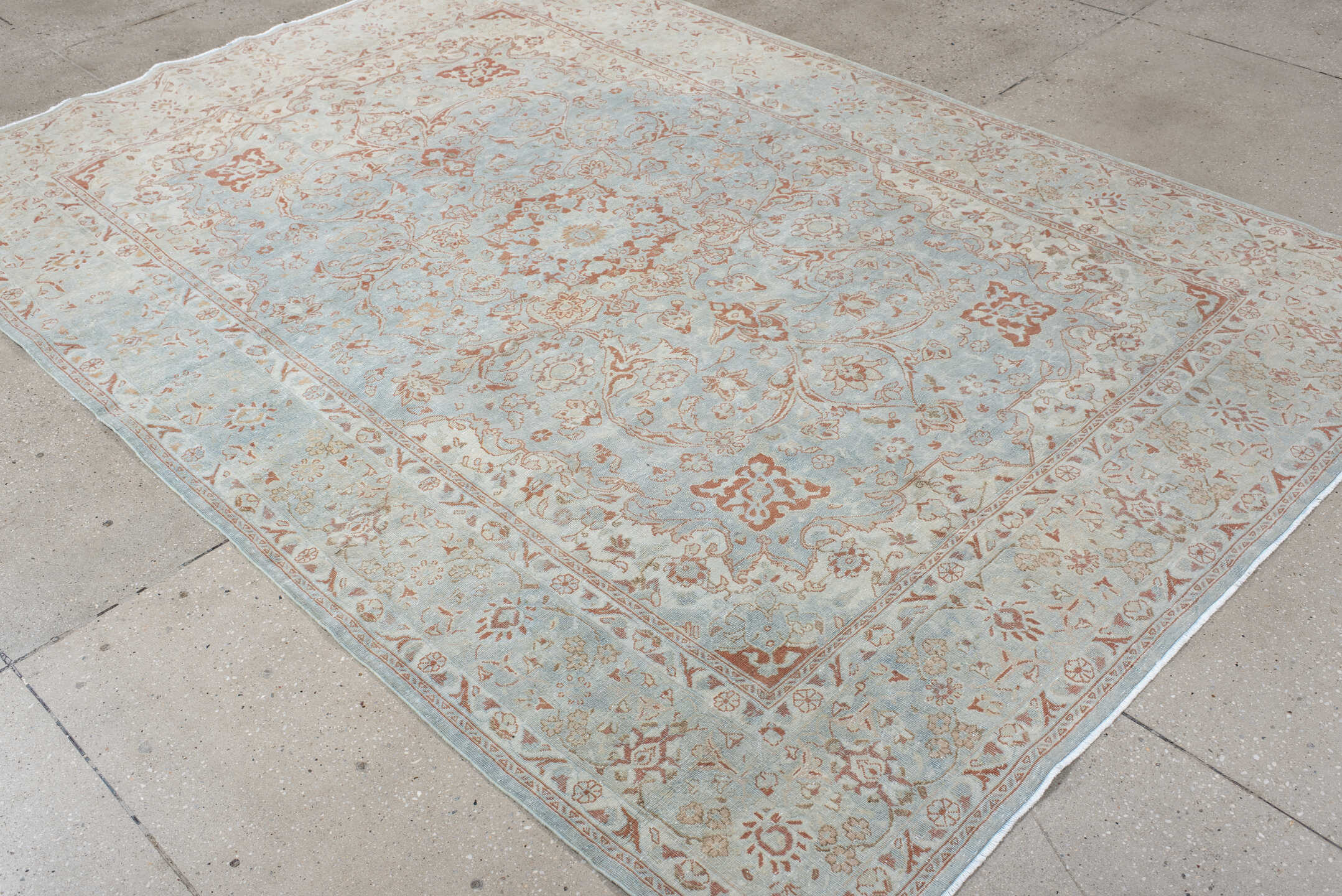 6' x 8' one-of-a-kind handmade antique Sarouk medium size rug. Color palette: ivory, pale blue, blush, peach, taupe