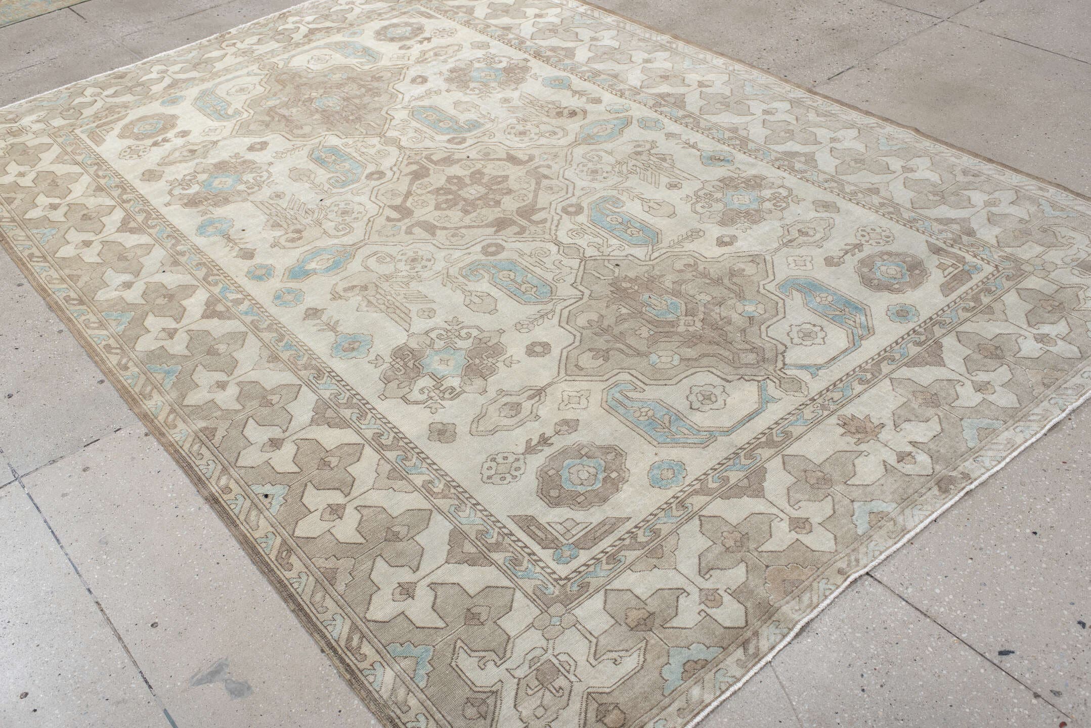 6' x 9' one-of-a-kind handmade antique Sivas medium size rug. Color palette: ivory, taupe, light blue, beige, cream, gray