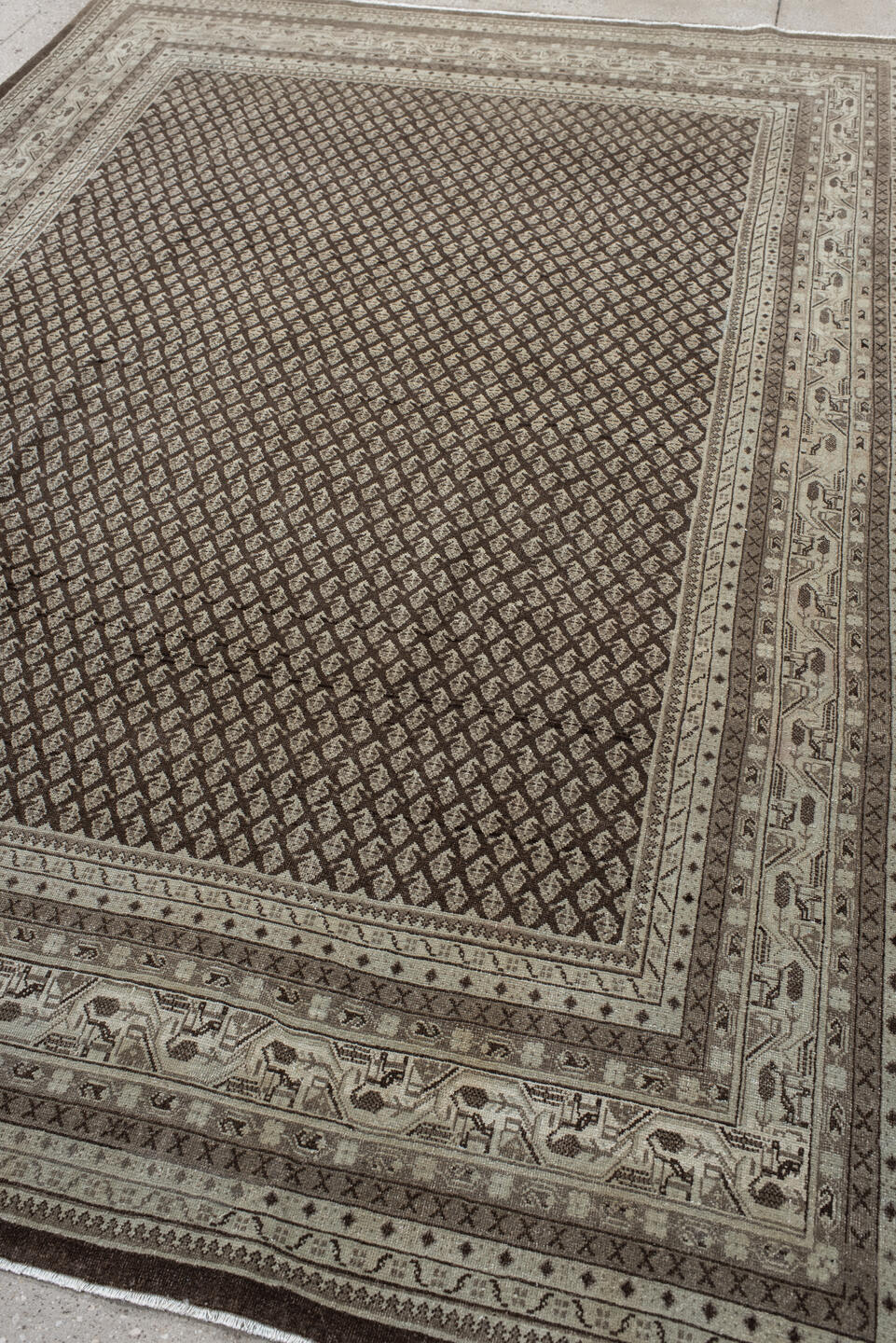 7' x 10' one-of-a-kind handmade vintage Mir large size rug. Color palette: black, brown, gray, light gray, off-white, pink